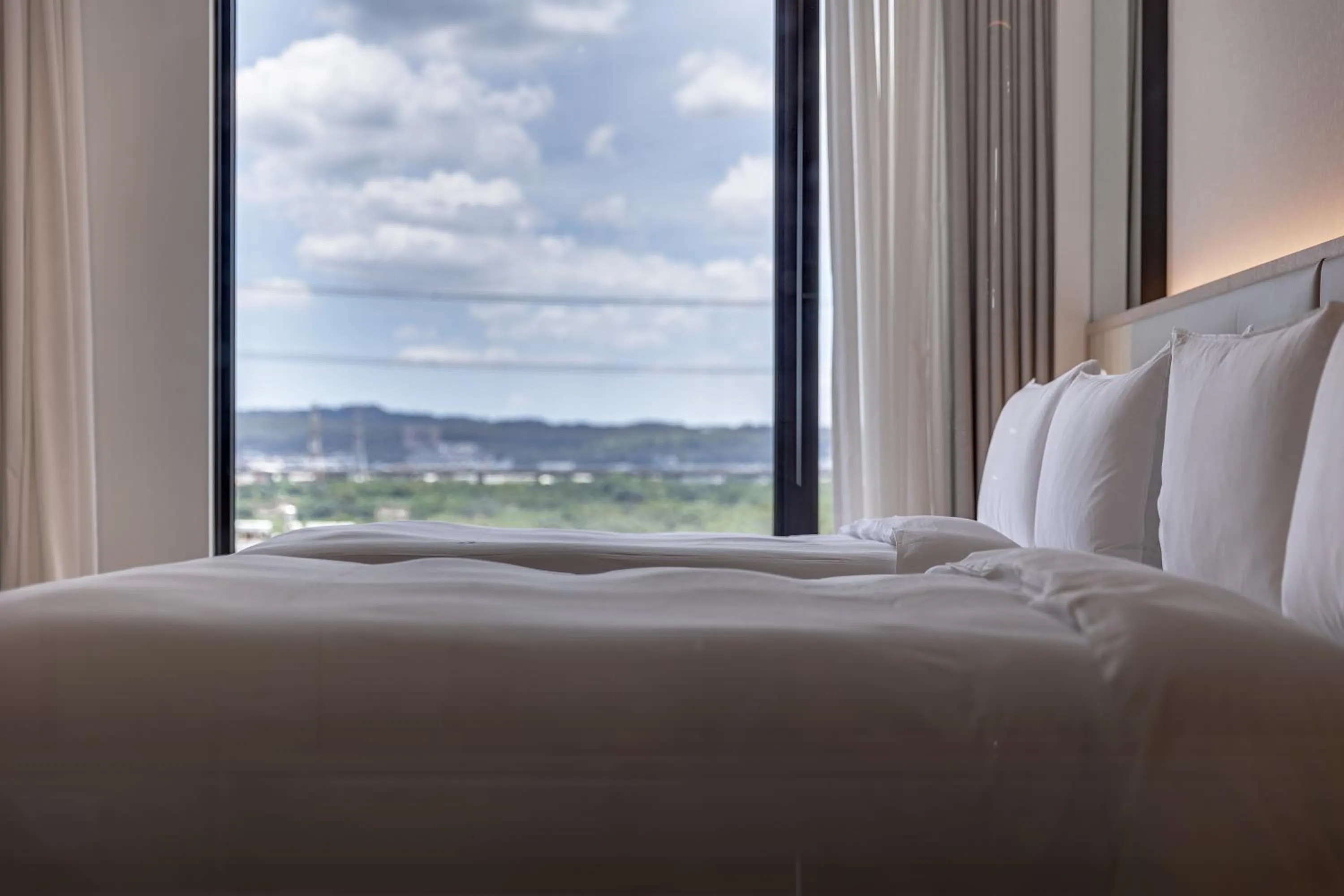 Bed in Boutech Wuri Village Hotel