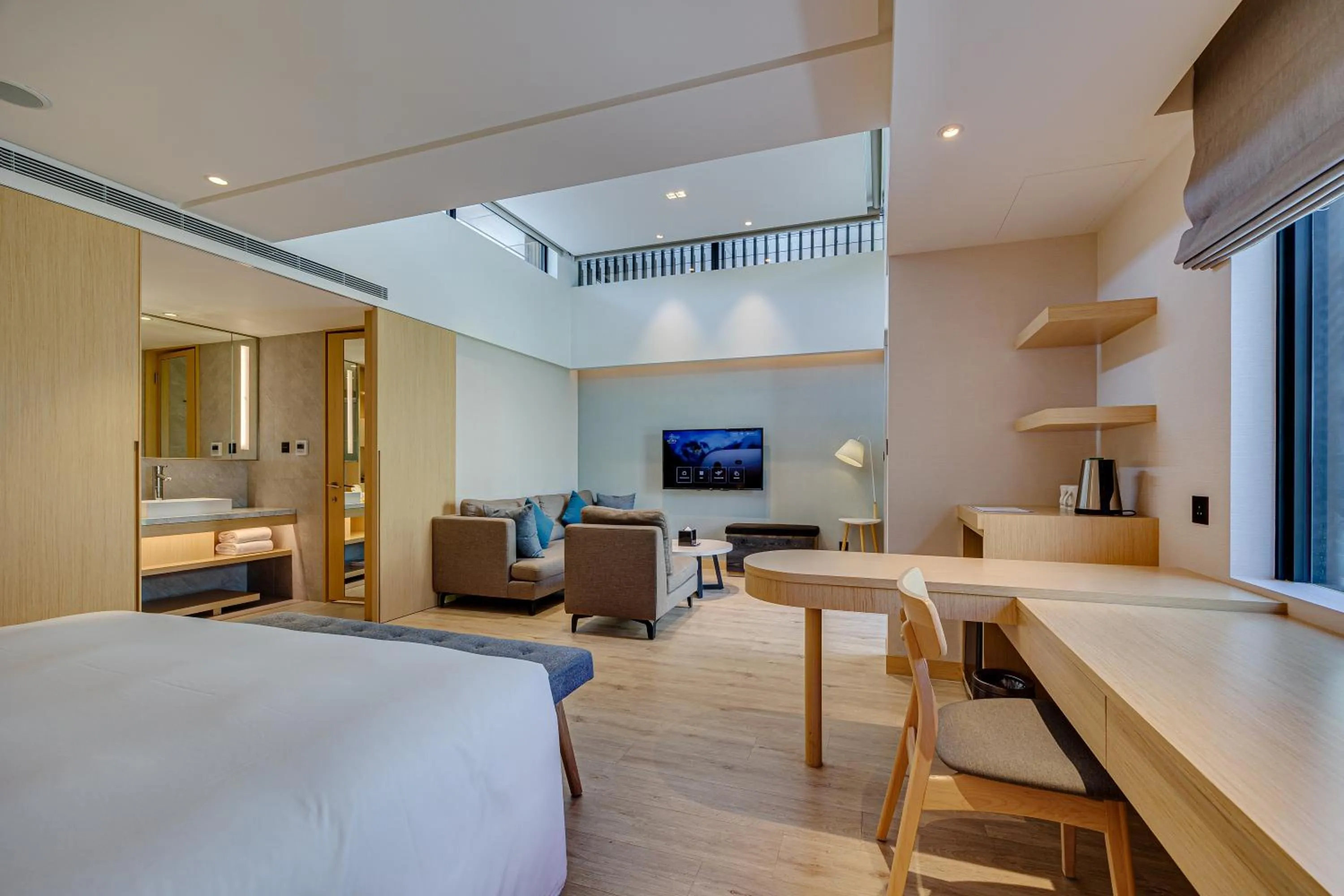 Bed in Boutech Wuri Village Hotel