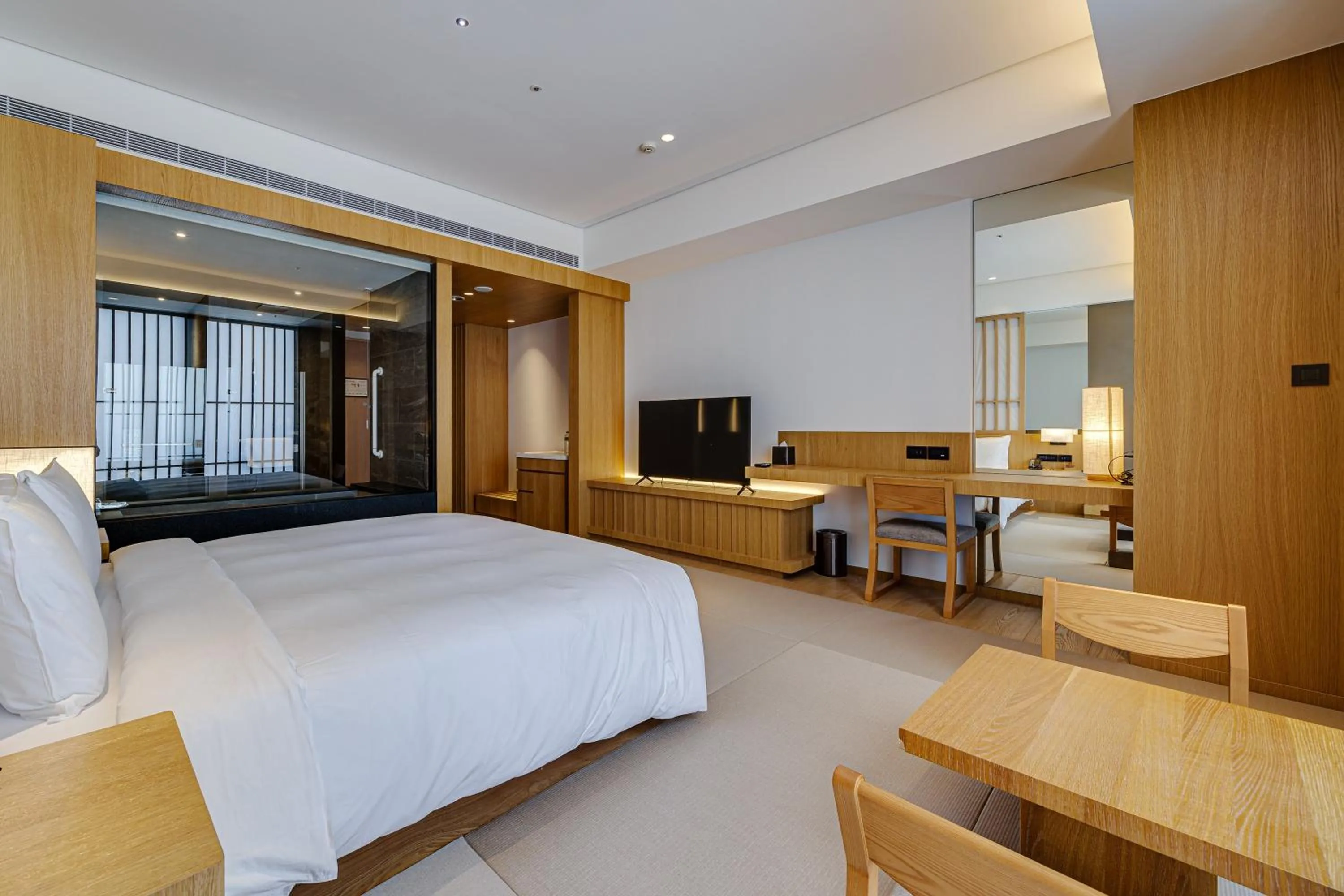 Bed in Boutech Wuri Village Hotel