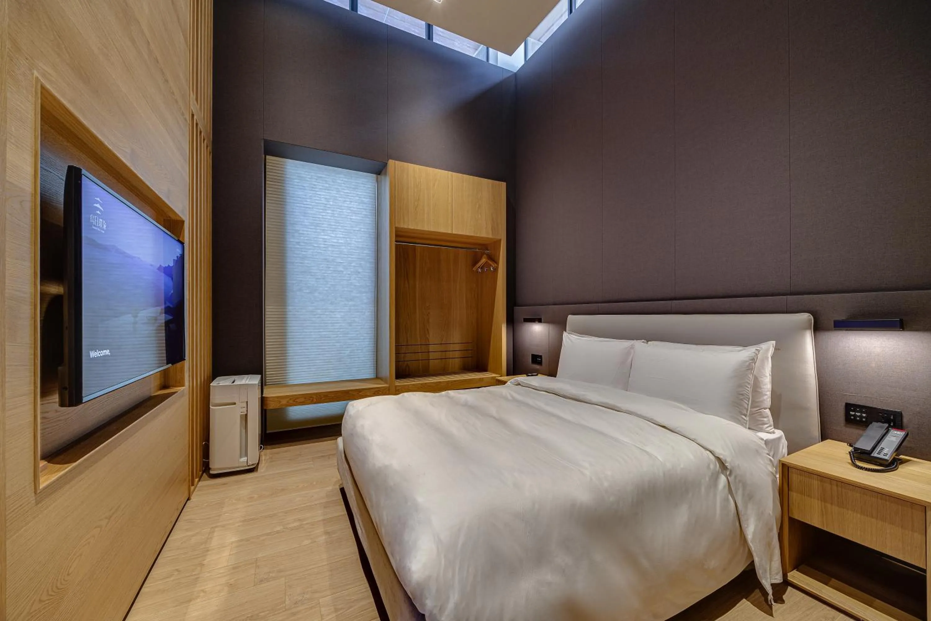 Bed in Boutech Wuri Village Hotel