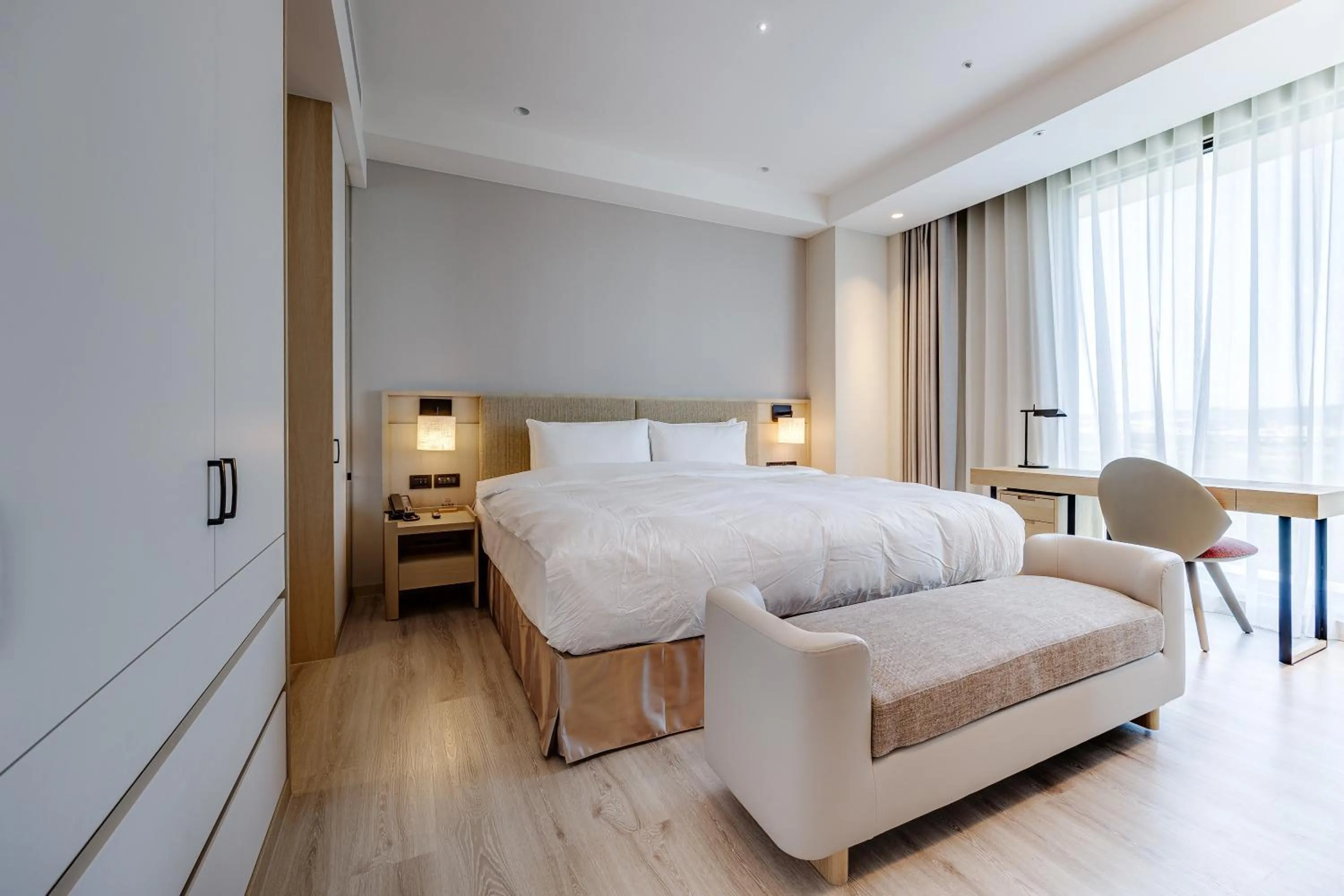 Bed in Boutech Wuri Village Hotel