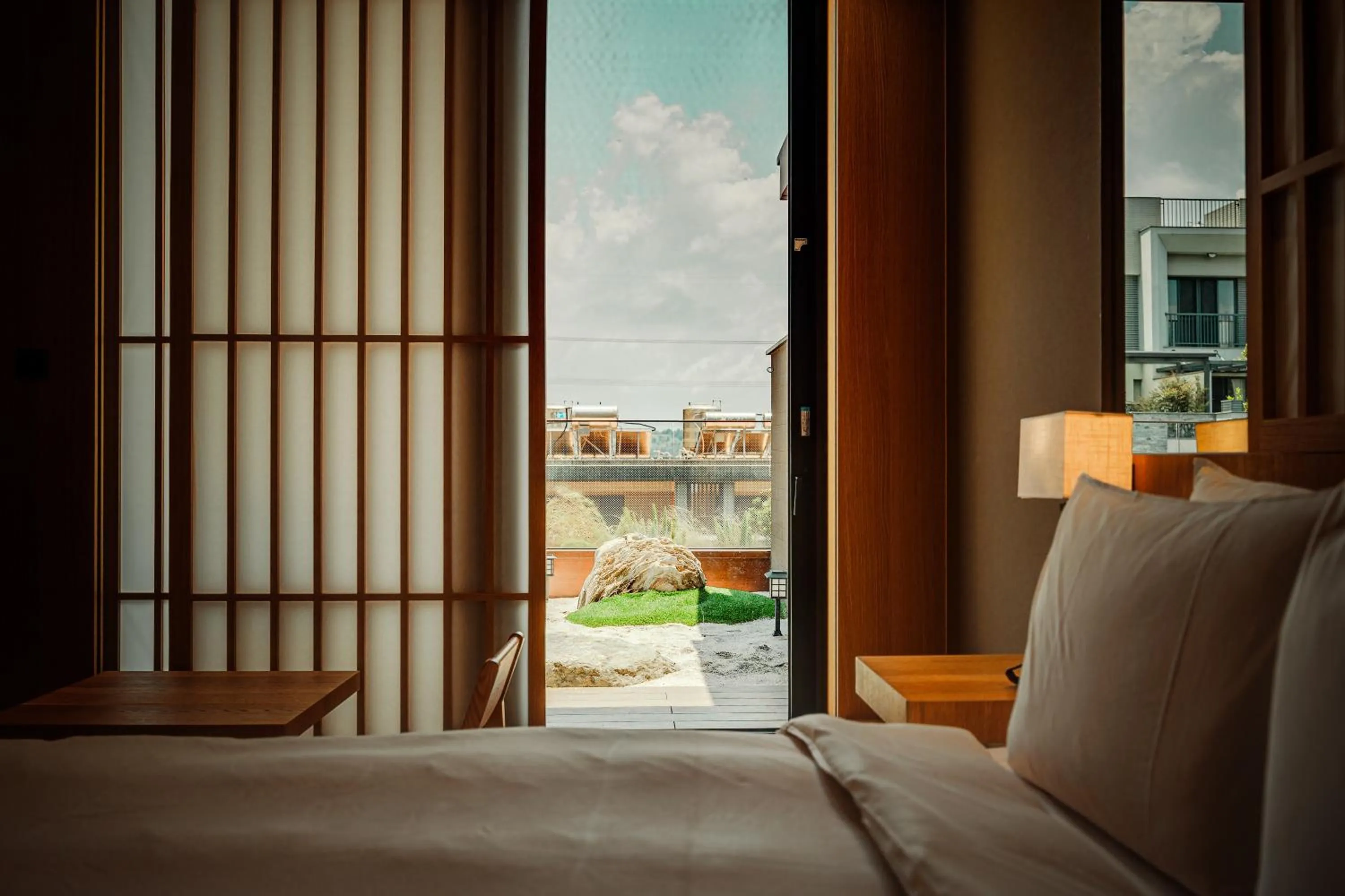 Bed in Boutech Wuri Village Hotel