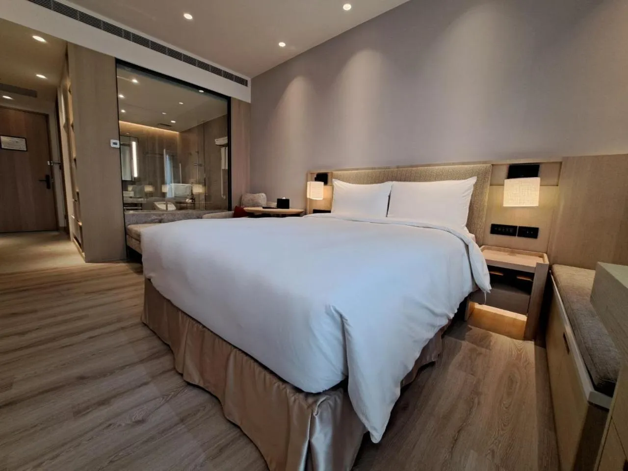 Bed in Boutech Wuri Village Hotel