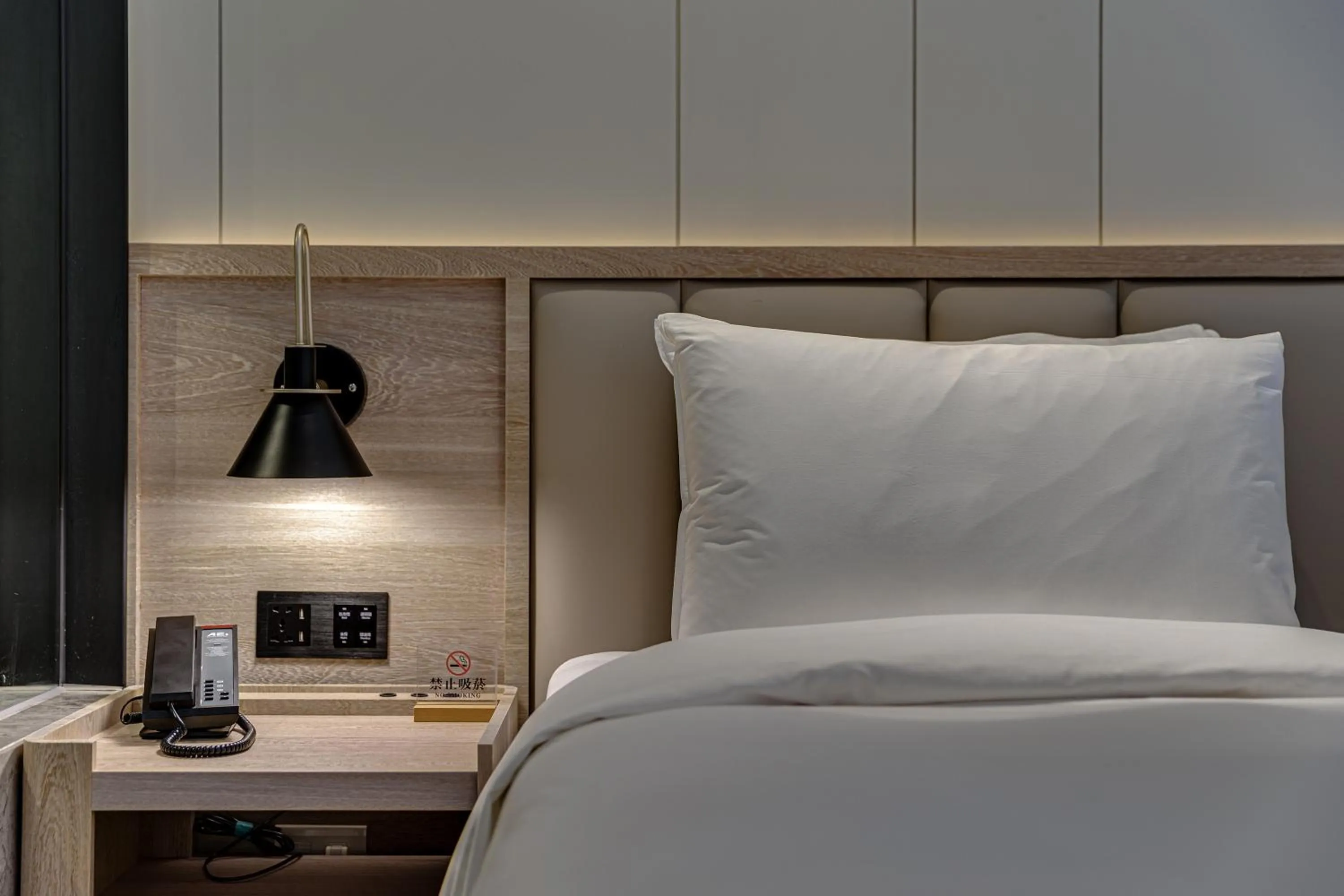 Bed in Boutech Wuri Village Hotel