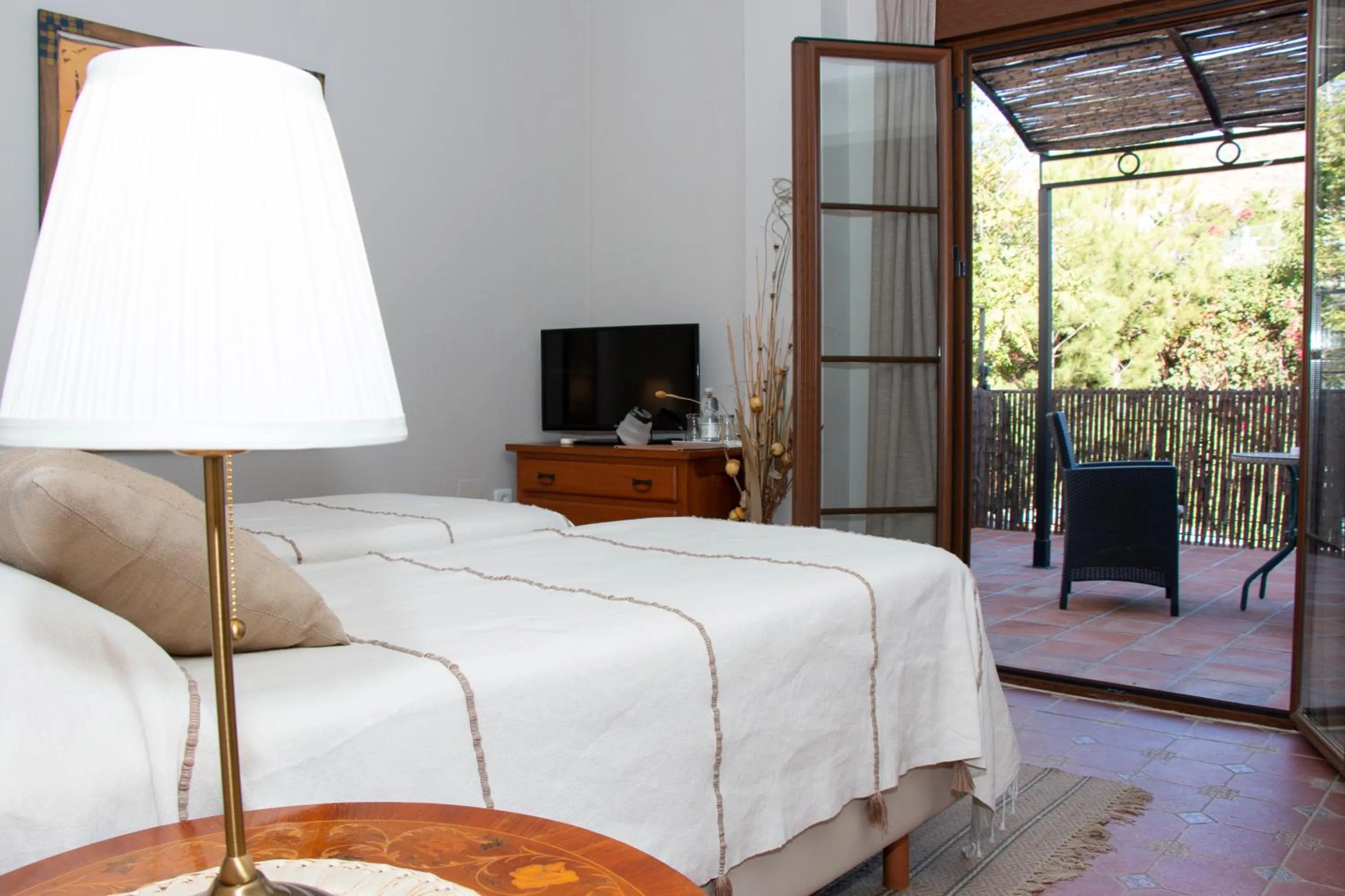 Bedroom in Hotel Cortijo de Salia