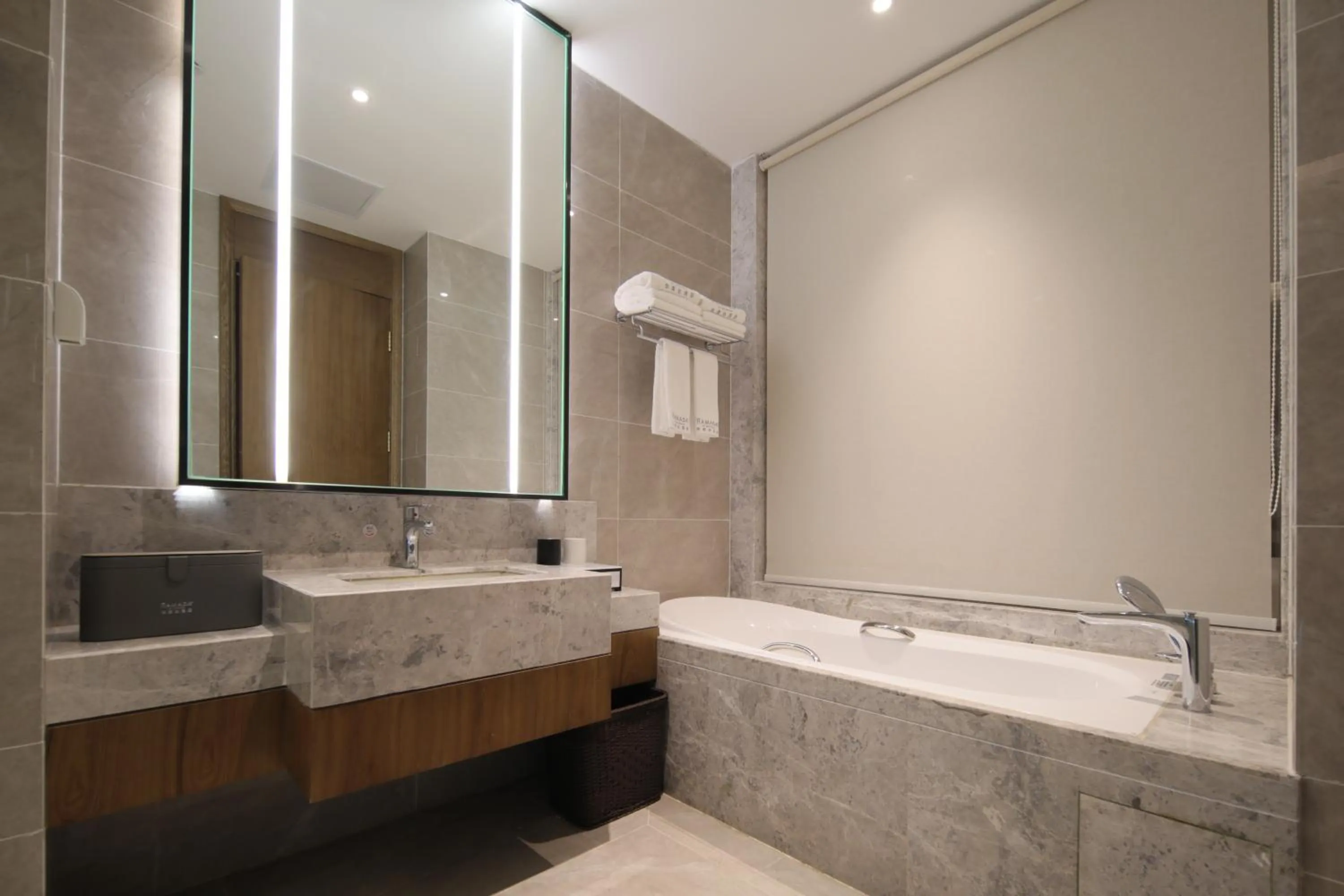 Bathroom in Ramada by Wyndham Wuhan Wangjiawan