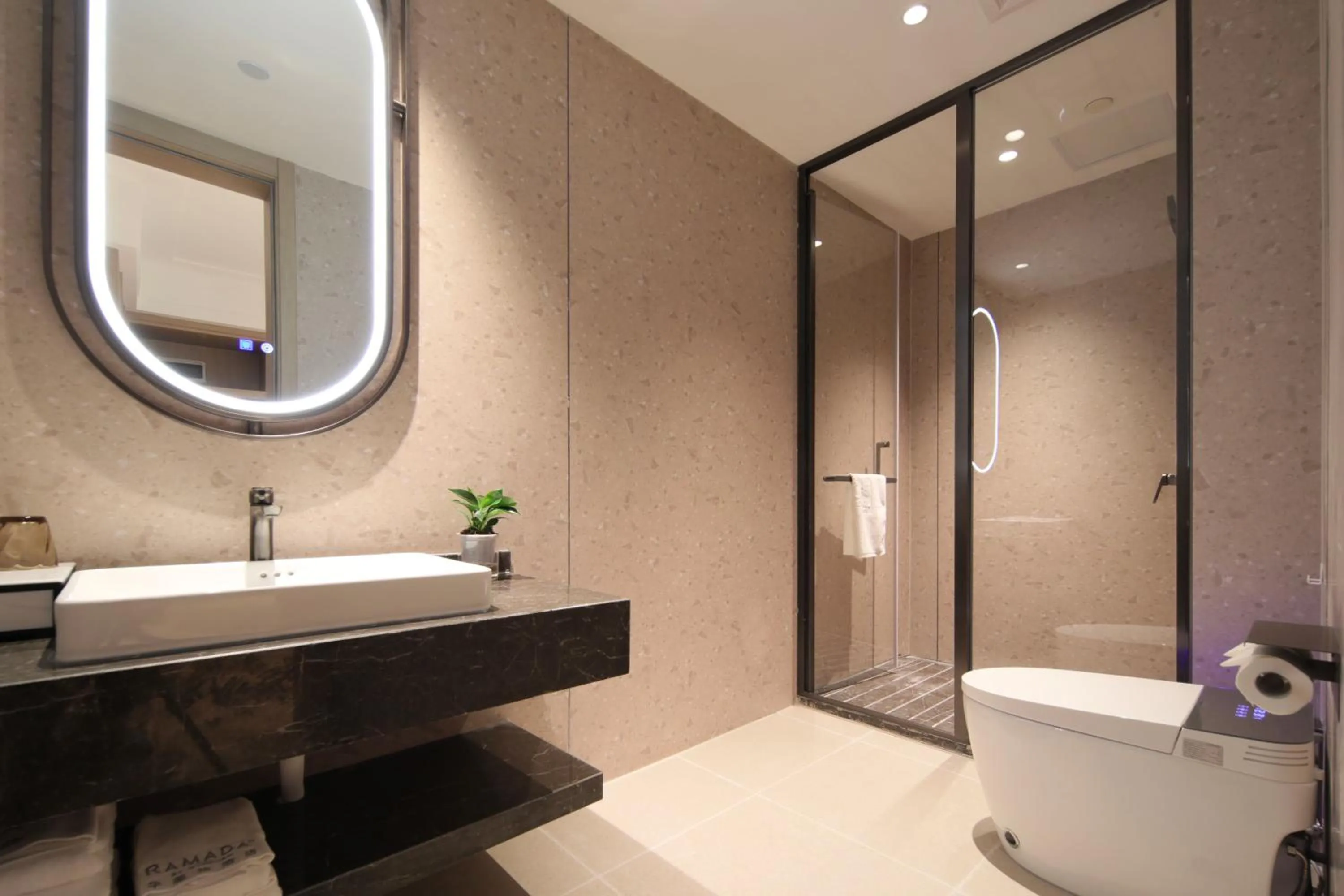 Shower in Ramada by Wyndham Wuhan Wangjiawan