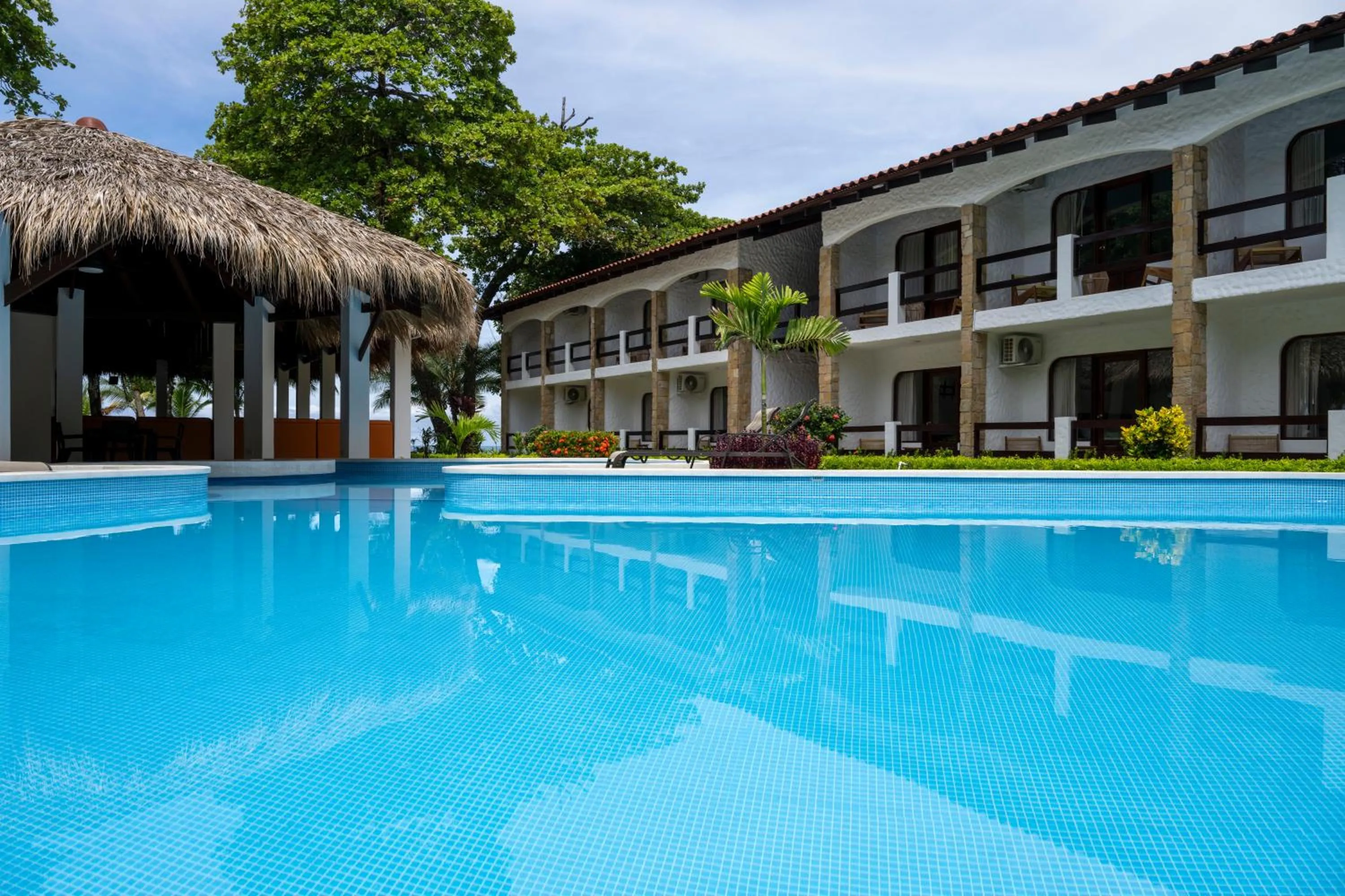 Swimming pool in Fuego del Sol Beachfront Hotel