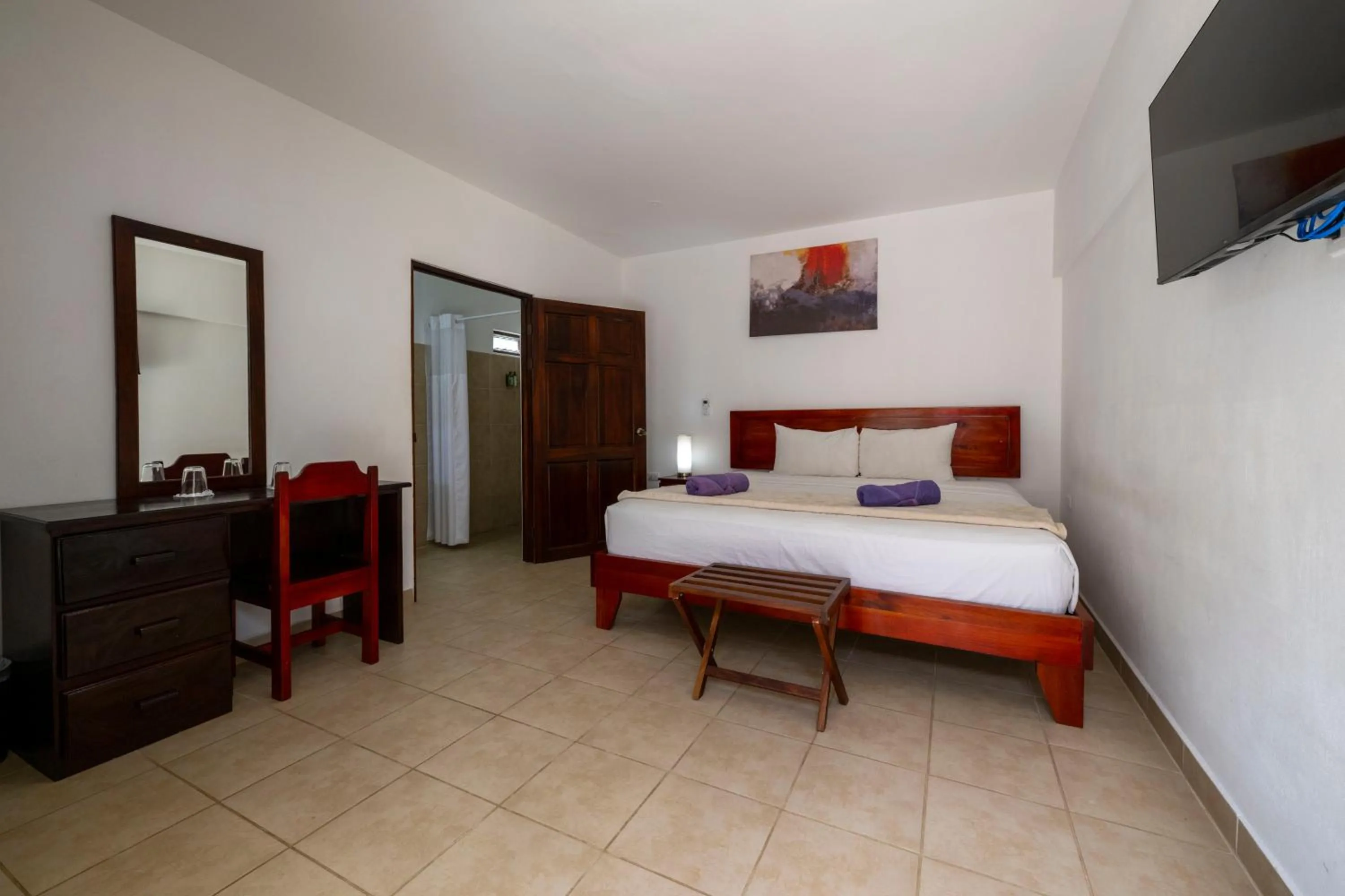 Bed in Fuego del Sol Beachfront Hotel