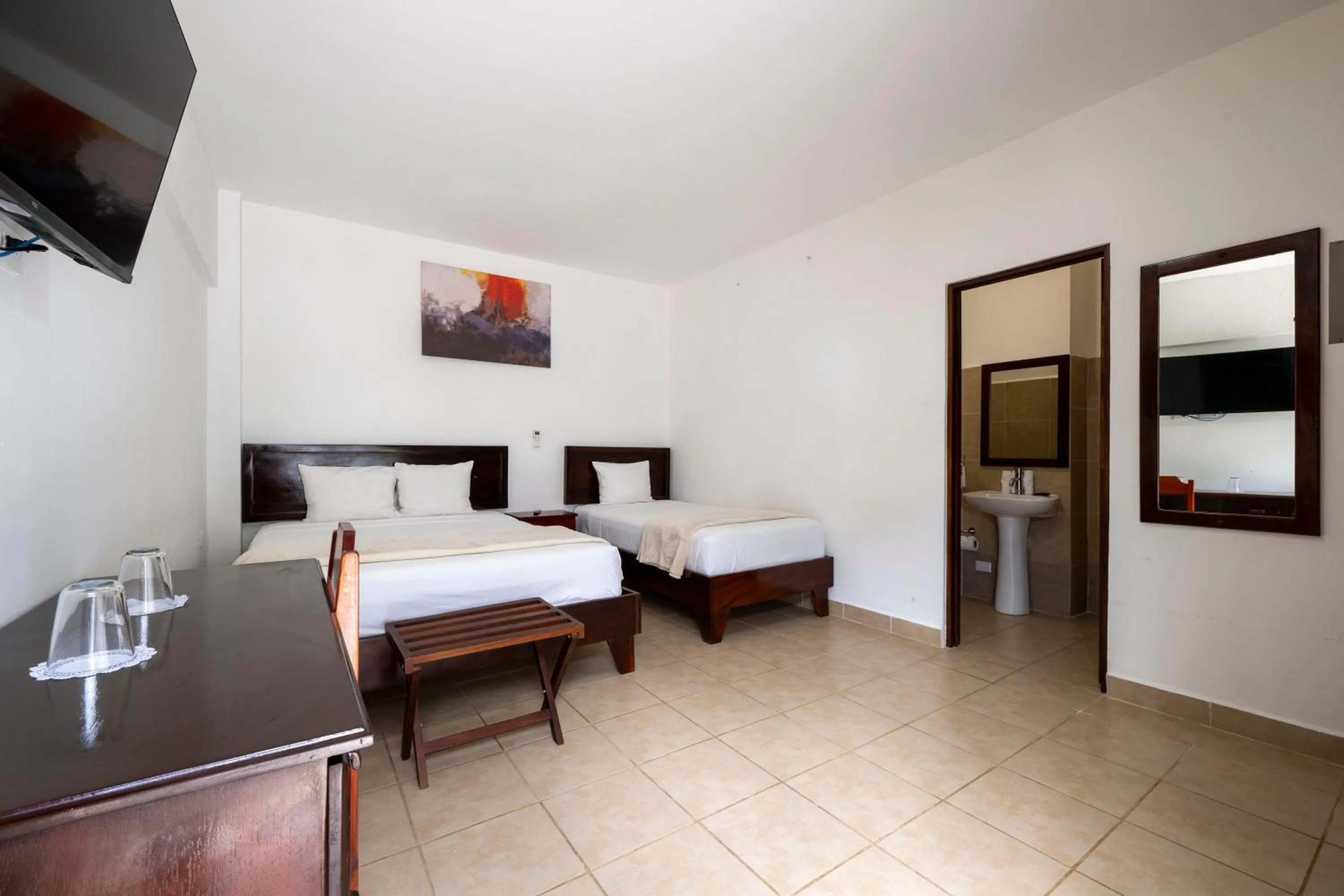 Bed in Fuego del Sol Beachfront Hotel