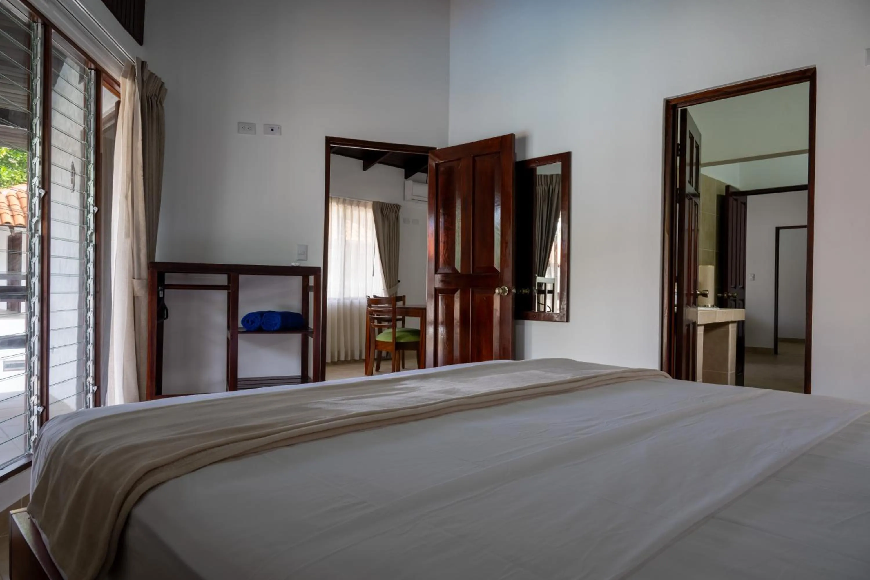 Bedroom, Bed in Fuego del Sol Beachfront Hotel
