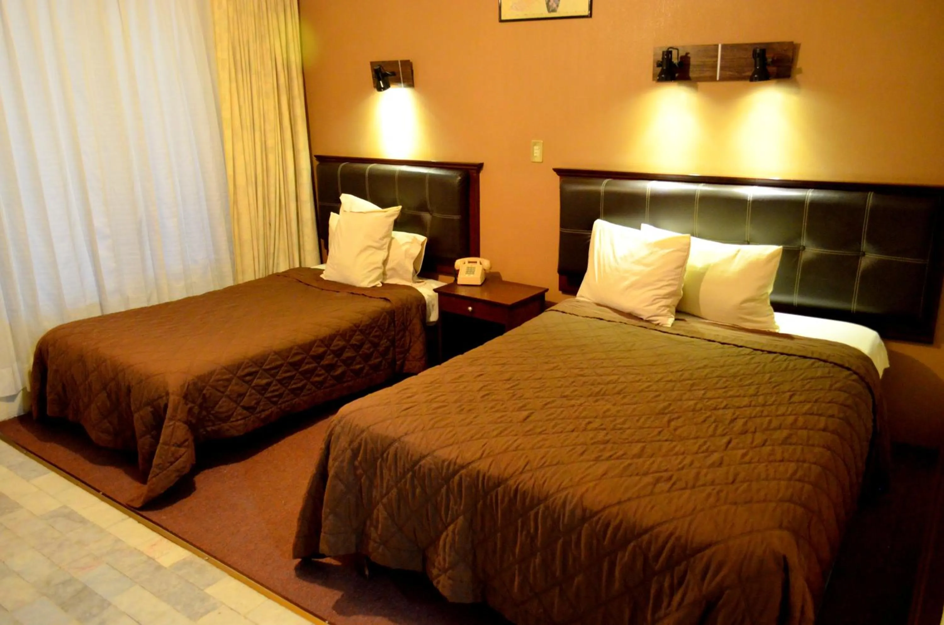 Bed in Hotel Flamingo Kristal