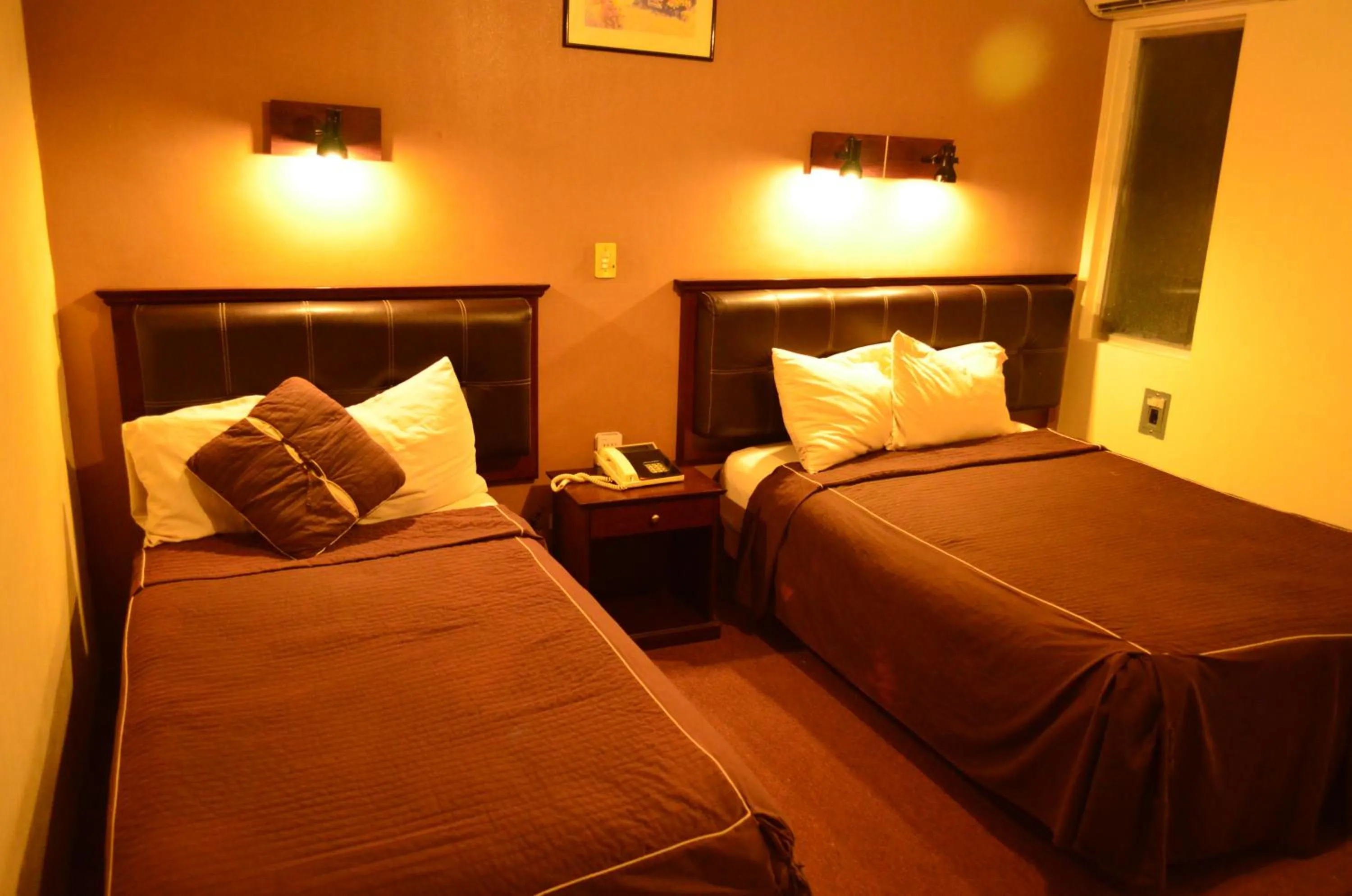 Bed in Hotel Flamingo Kristal