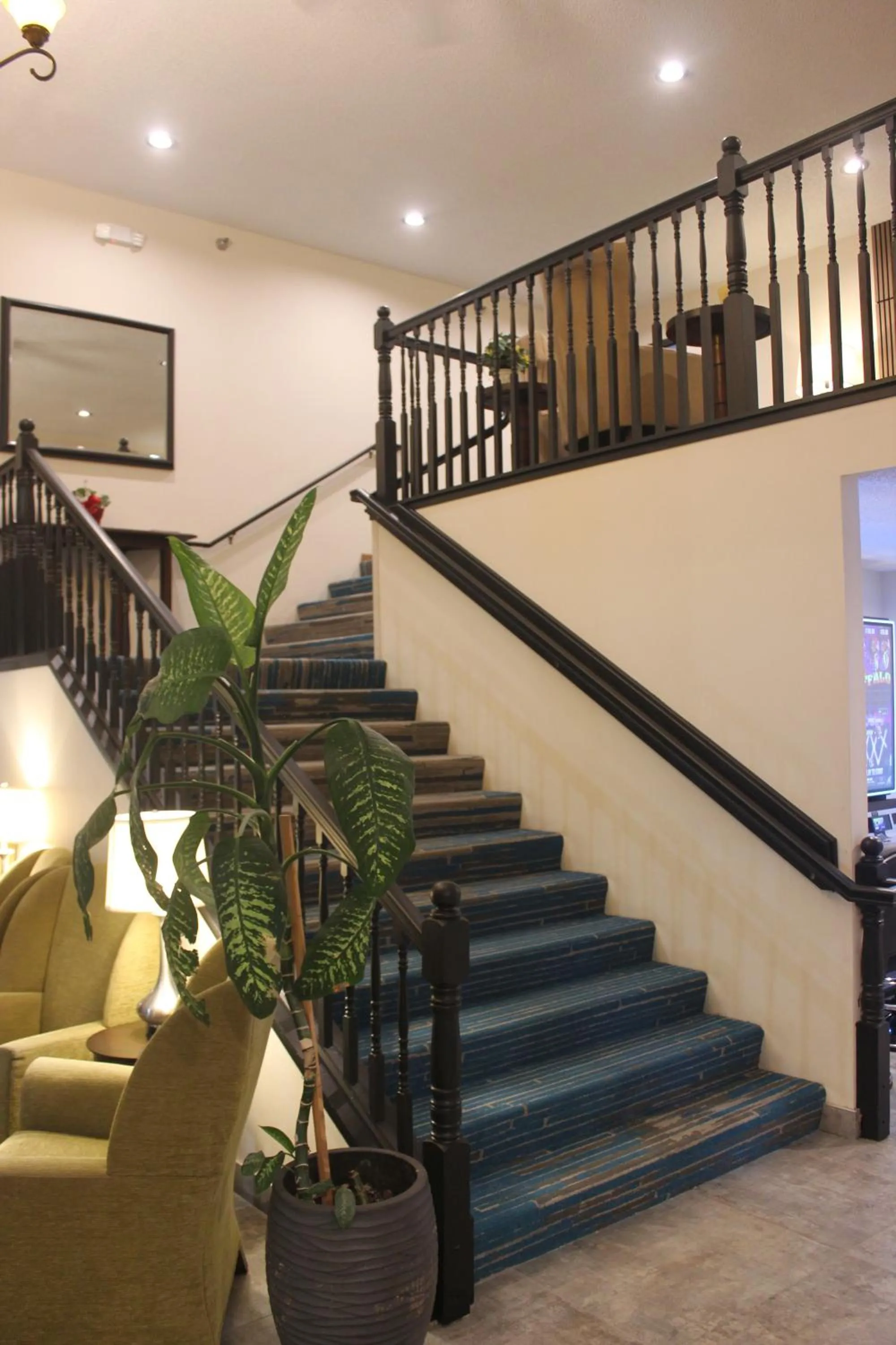 Lobby or reception in Alliance Hotel & Suites, a Howard Johnson by Wyndham