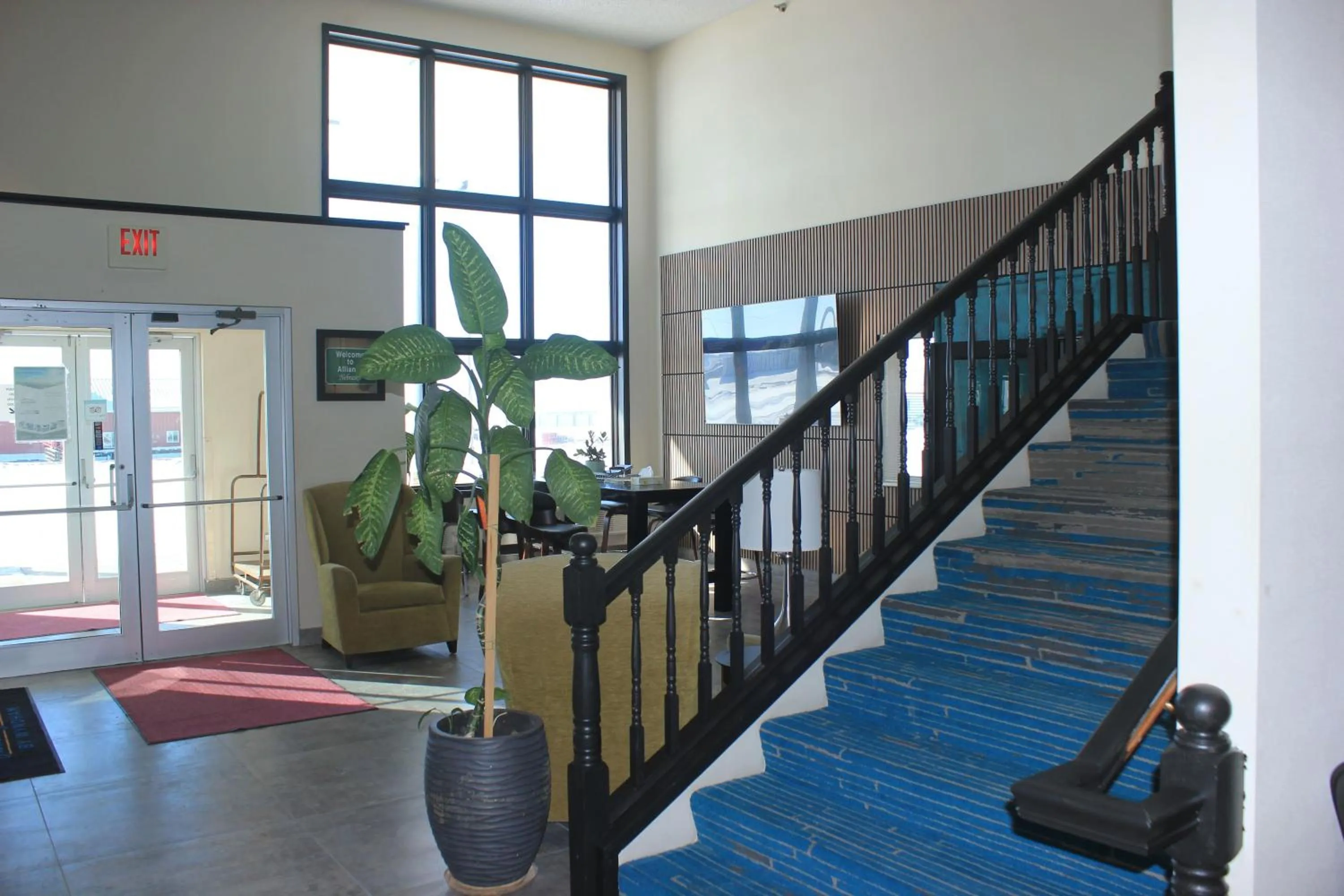 Lobby or reception in Alliance Hotel & Suites, a Howard Johnson by Wyndham