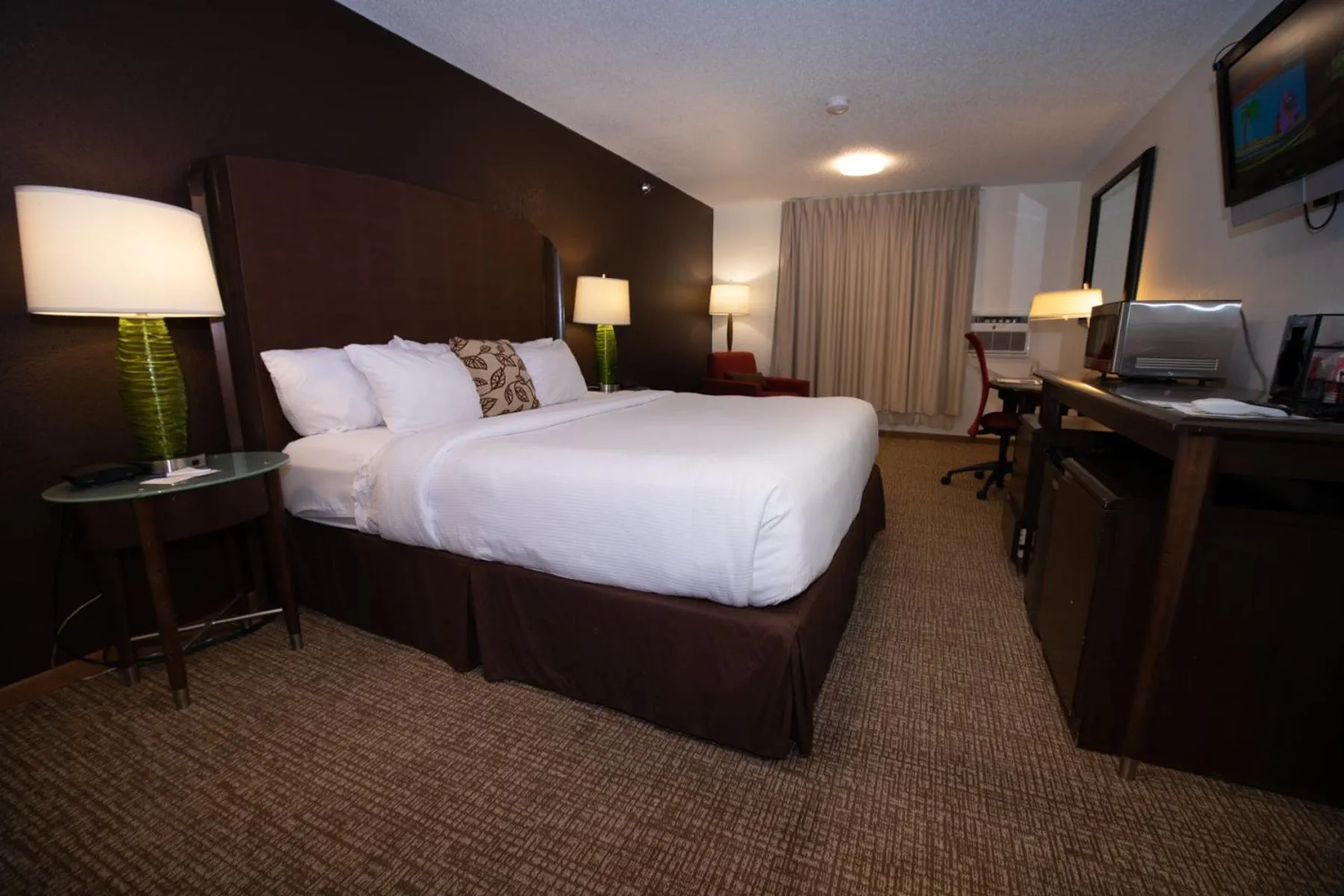 Bedroom, Bed in Alliance Hotel & Suites, a Howard Johnson by Wyndham