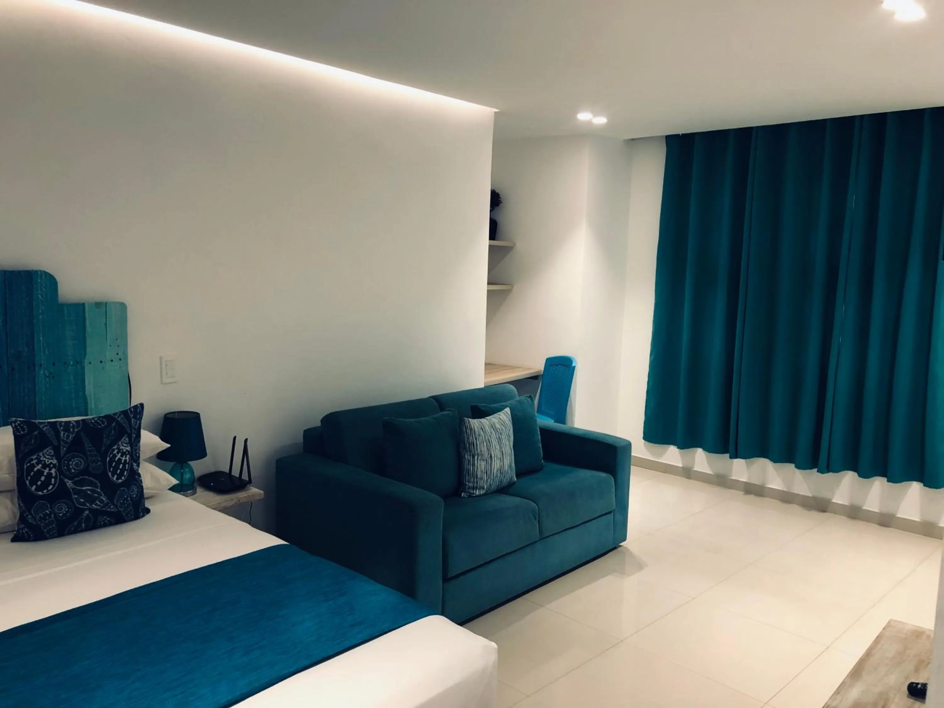 Bedroom, Bed in White Coral ApartaSuites