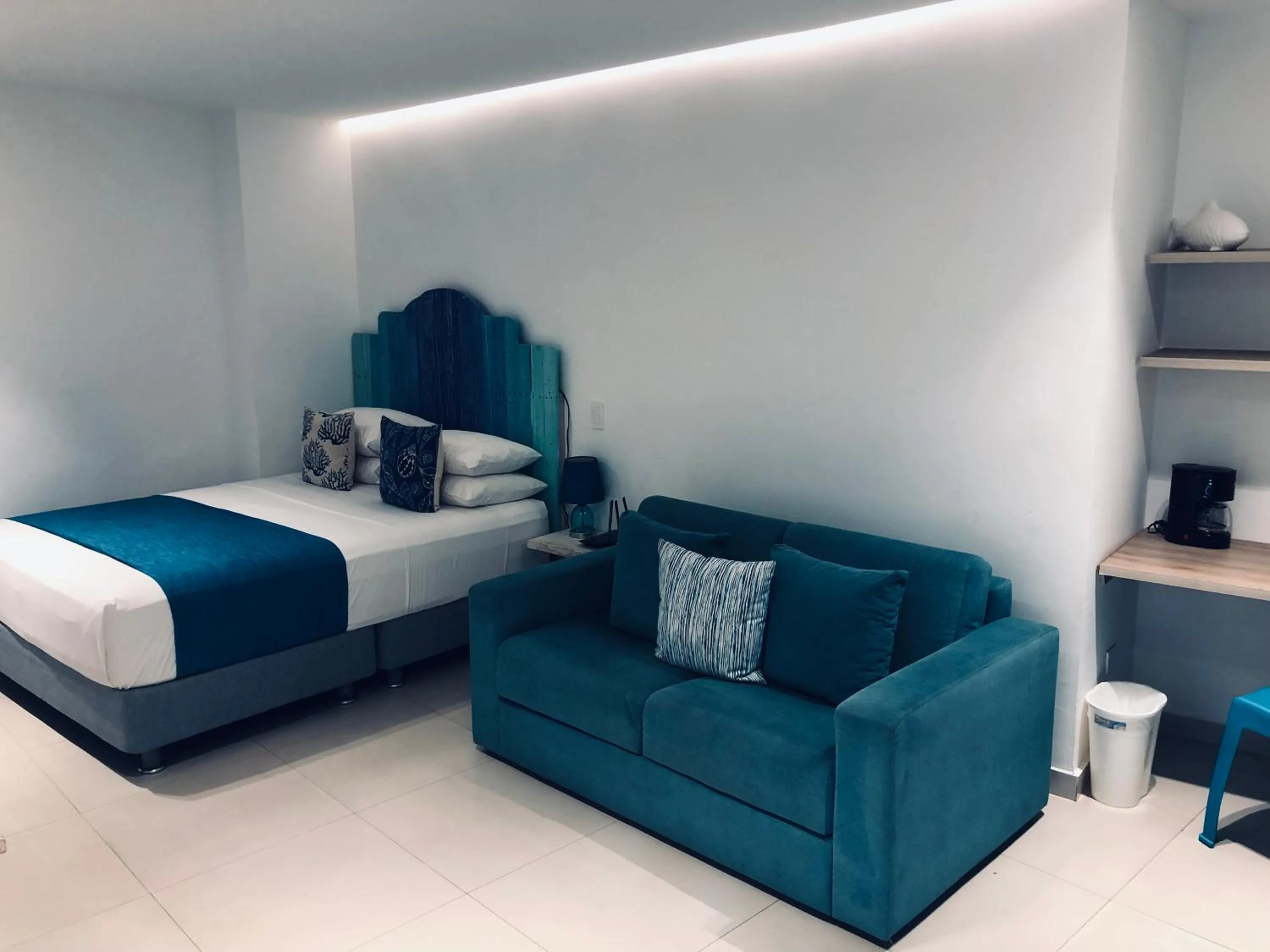 Bedroom, Bed in White Coral ApartaSuites