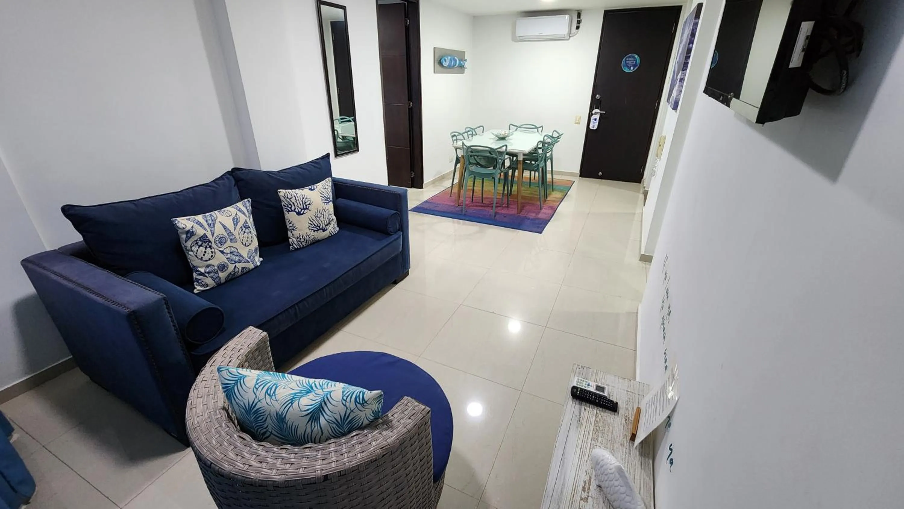Communal lounge/ TV room in White Coral ApartaSuites