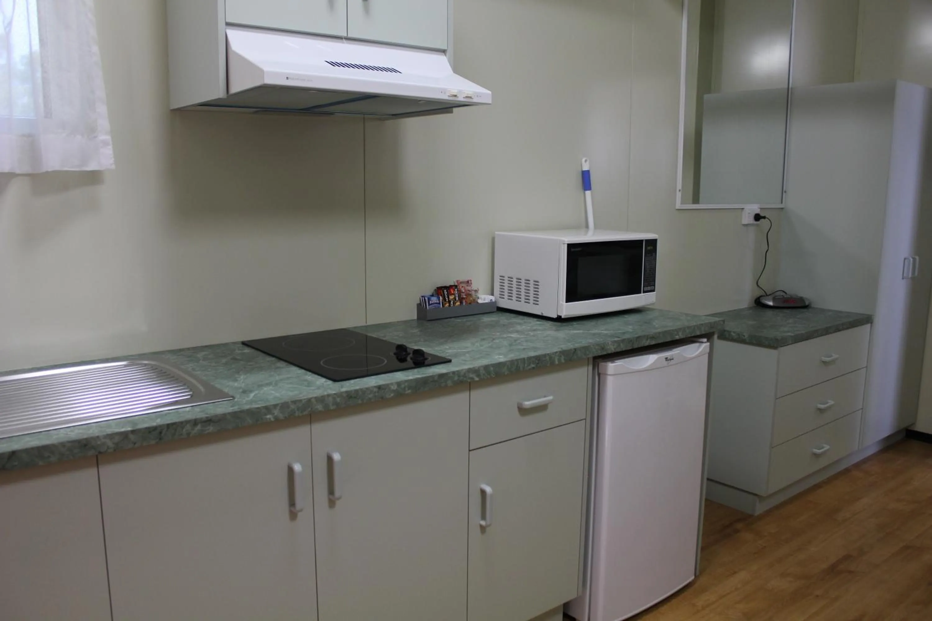 Kitchen or kitchenette in Aussie Outback Oasis Holiday Park