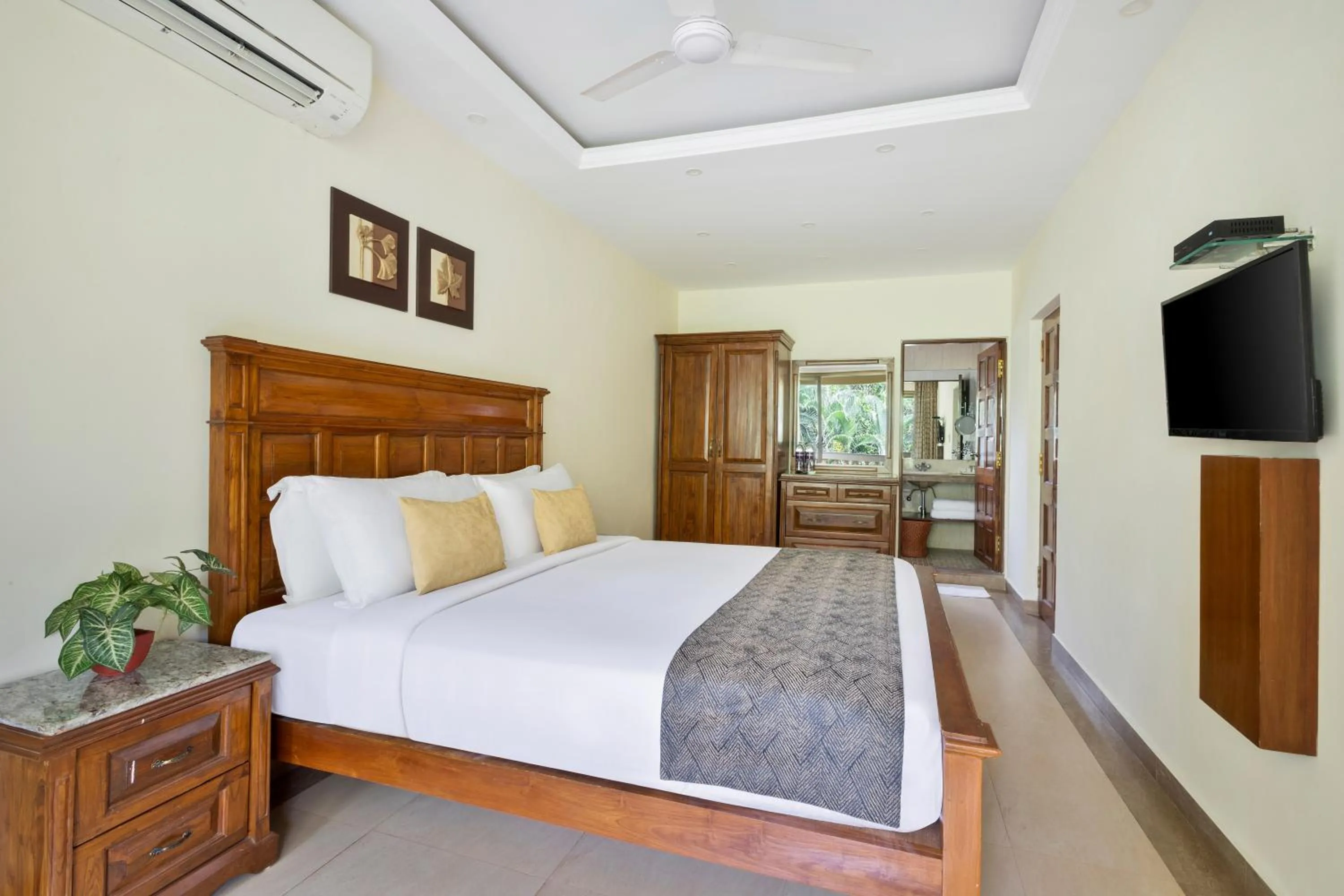 Bed in De Mandarin Beach Resort Suites & Villas, Candolim