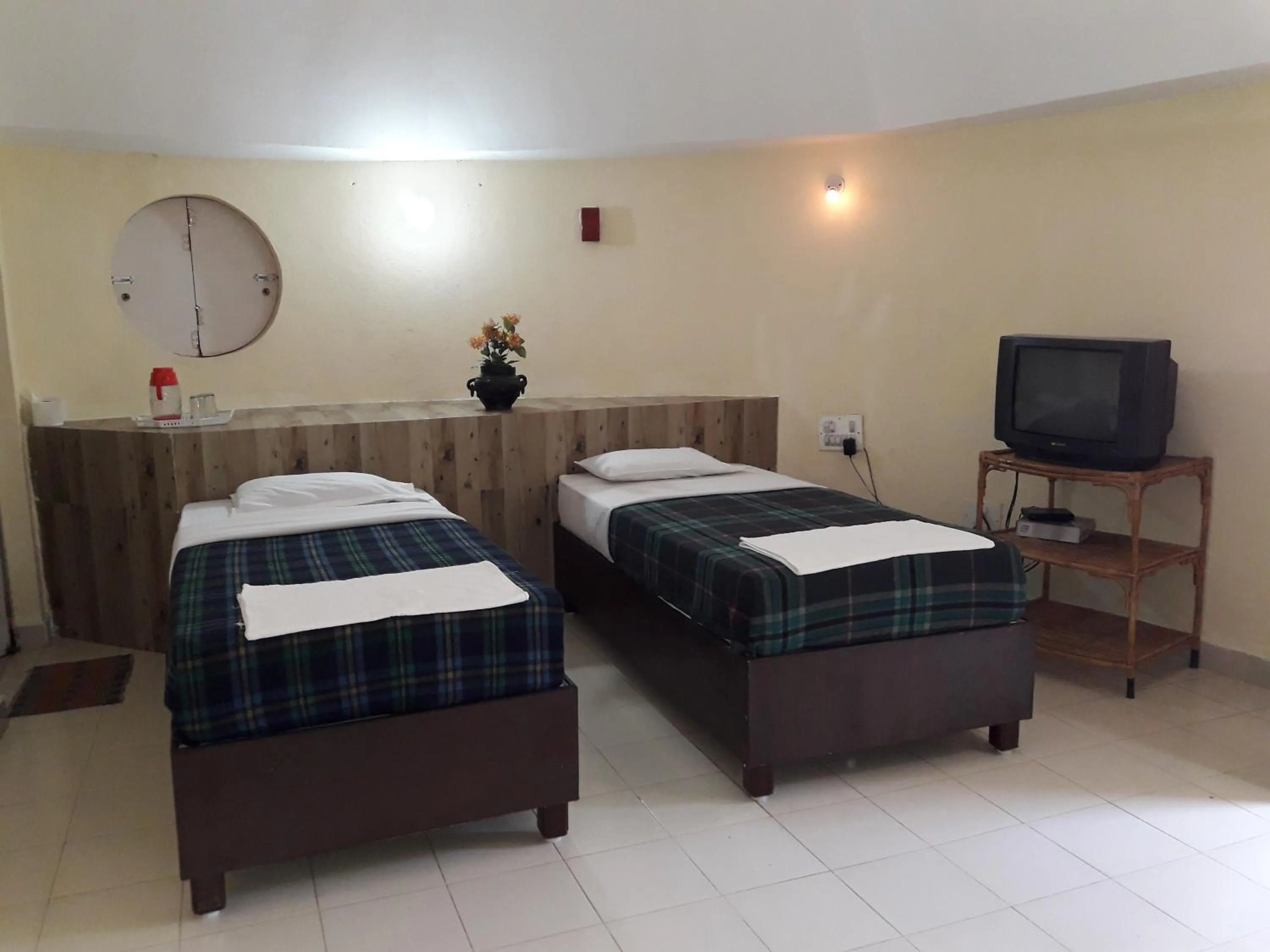 Bedroom in Kishkinda Heritage Resort