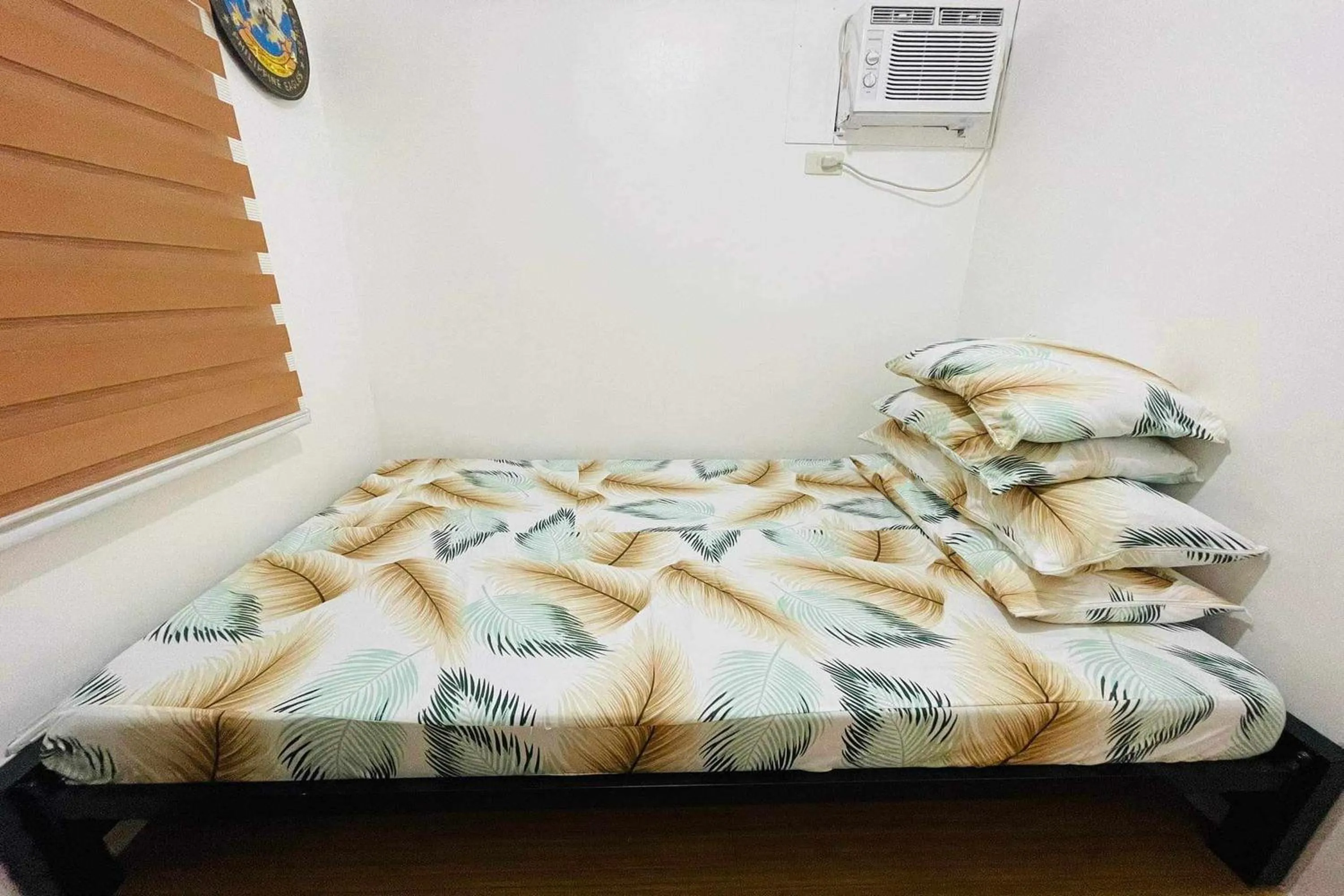 Bed in Shiella's Staycation House Cabanatuan