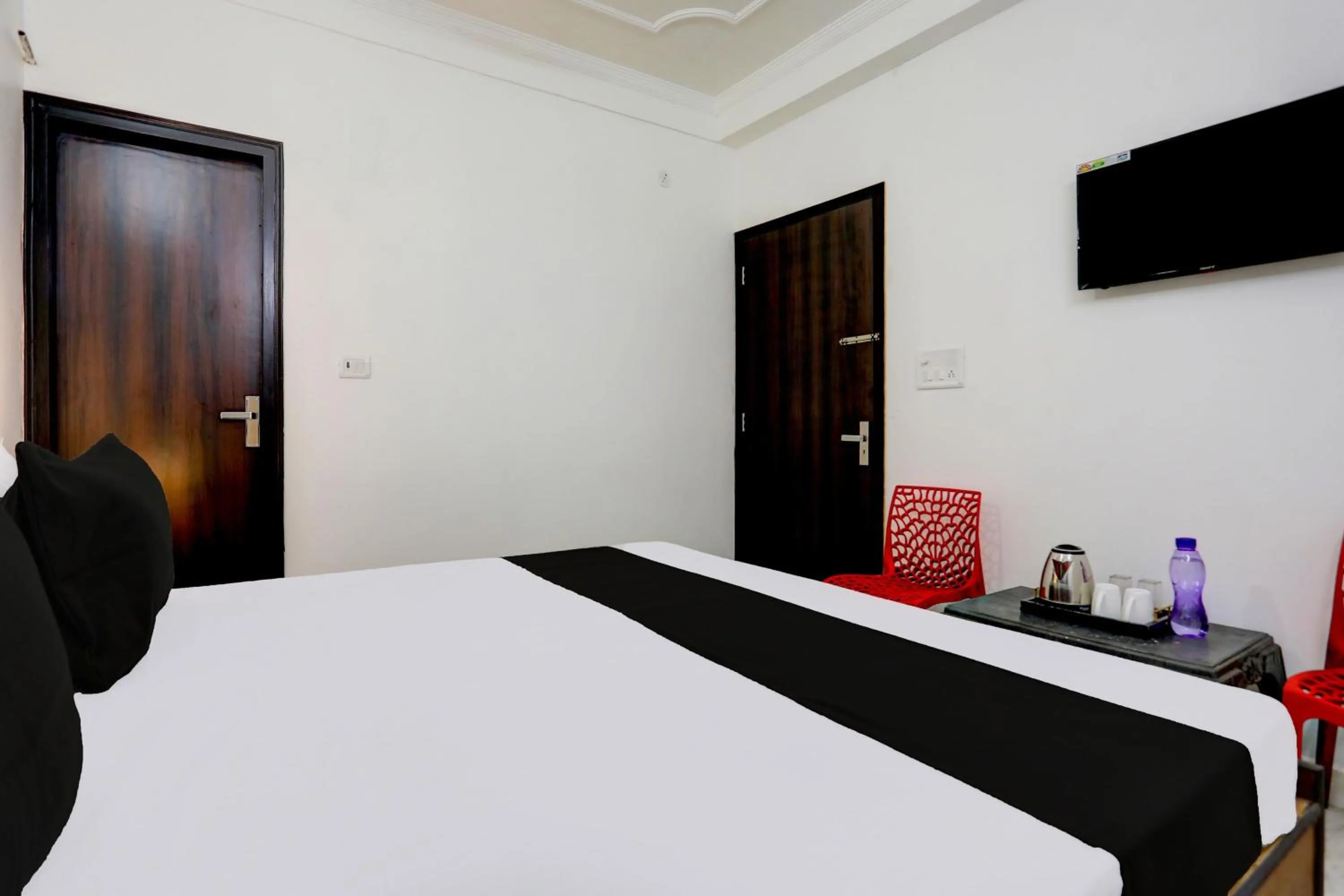Bedroom in Hotel O 4 Square Residency