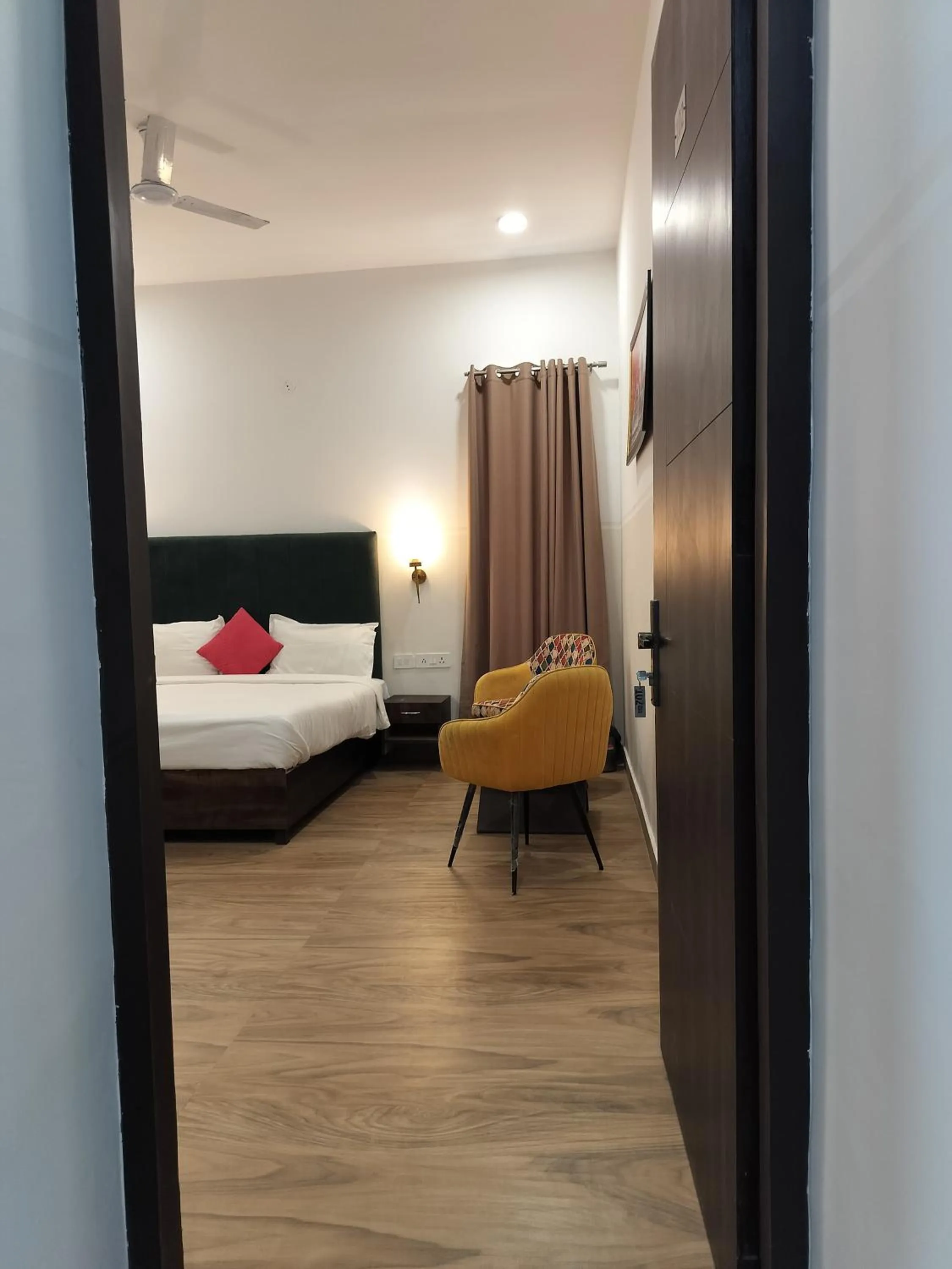 Bedroom, Bed in Saffron Inn - Expo India Mart