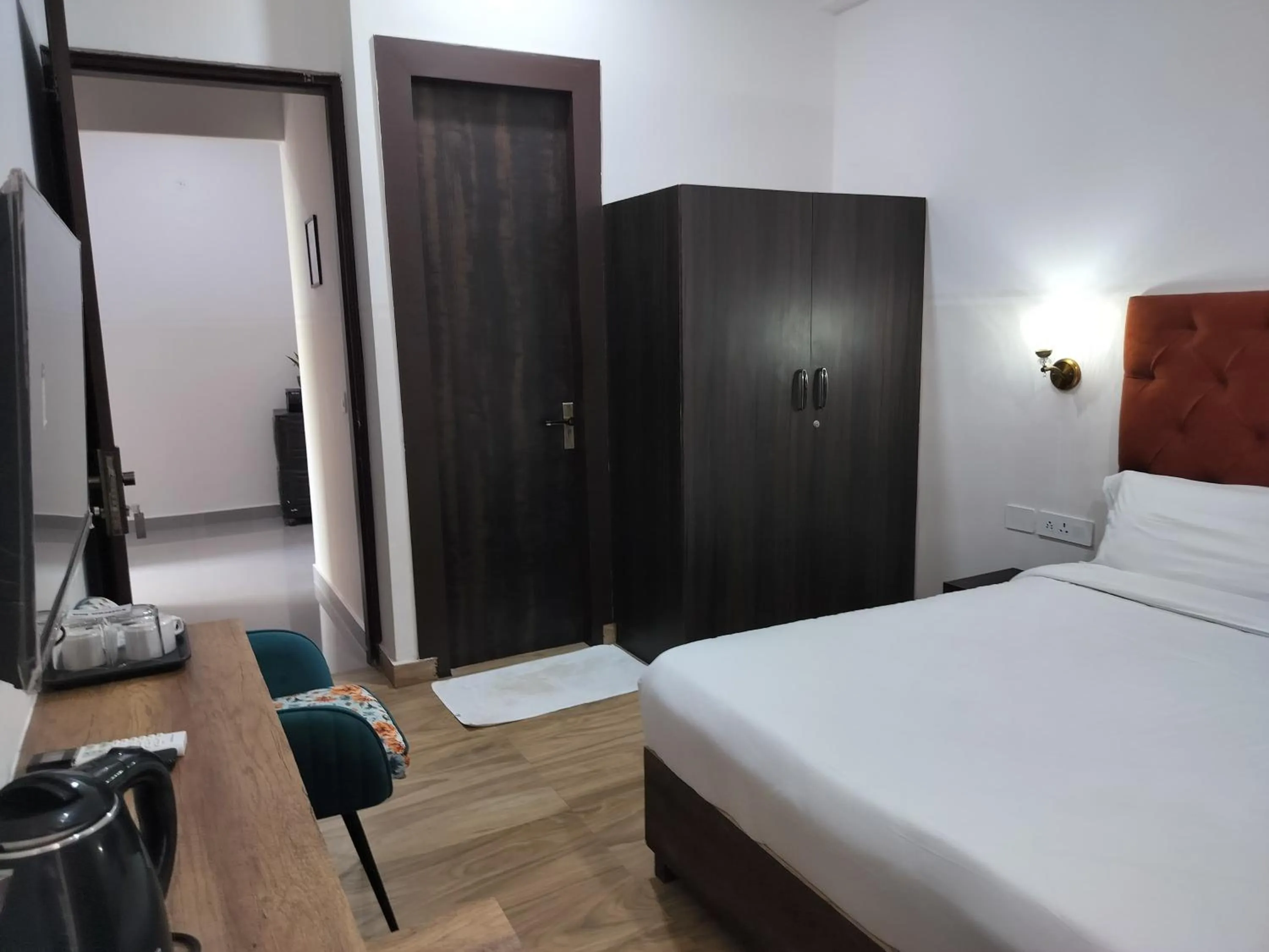 Bedroom, Bed in Saffron Inn - Expo India Mart