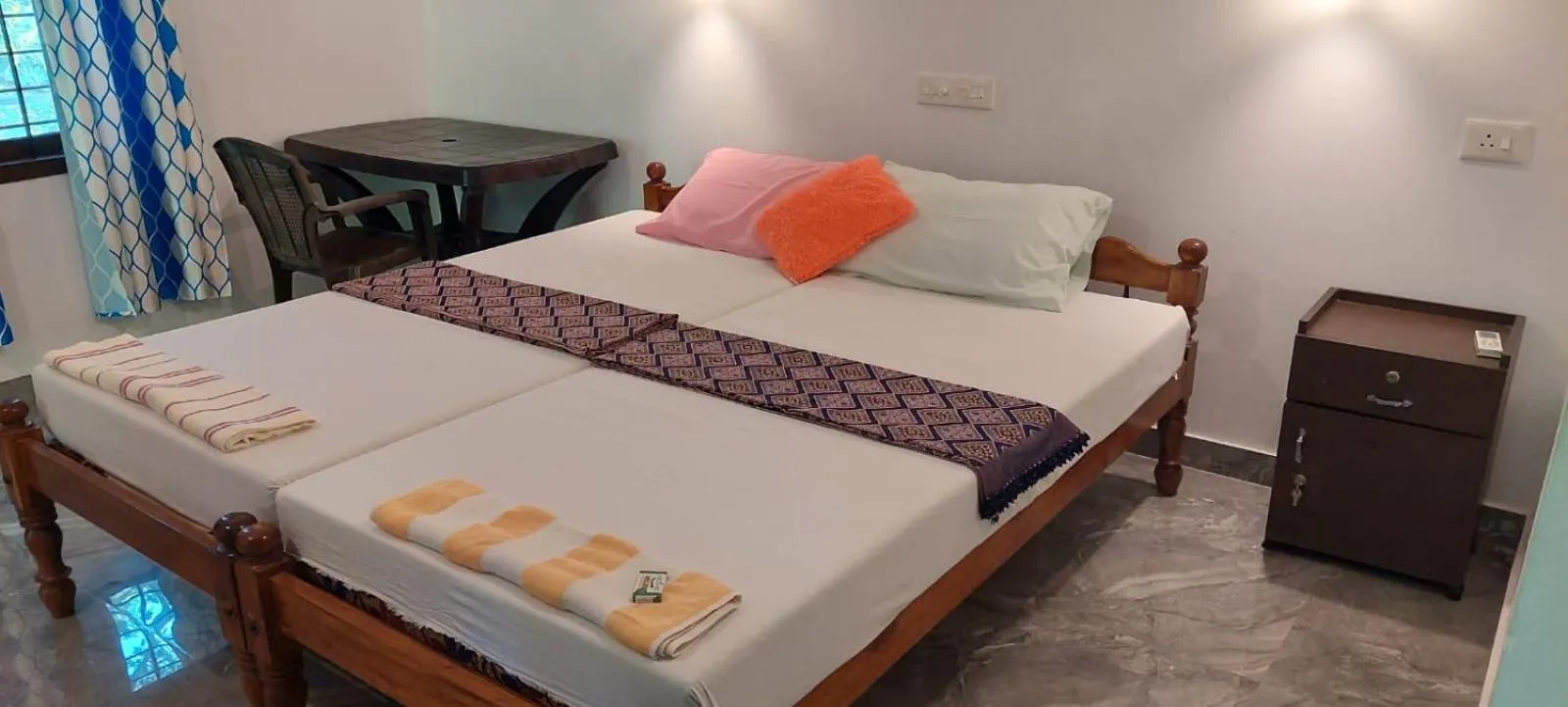 Bed in Marari Beach House
