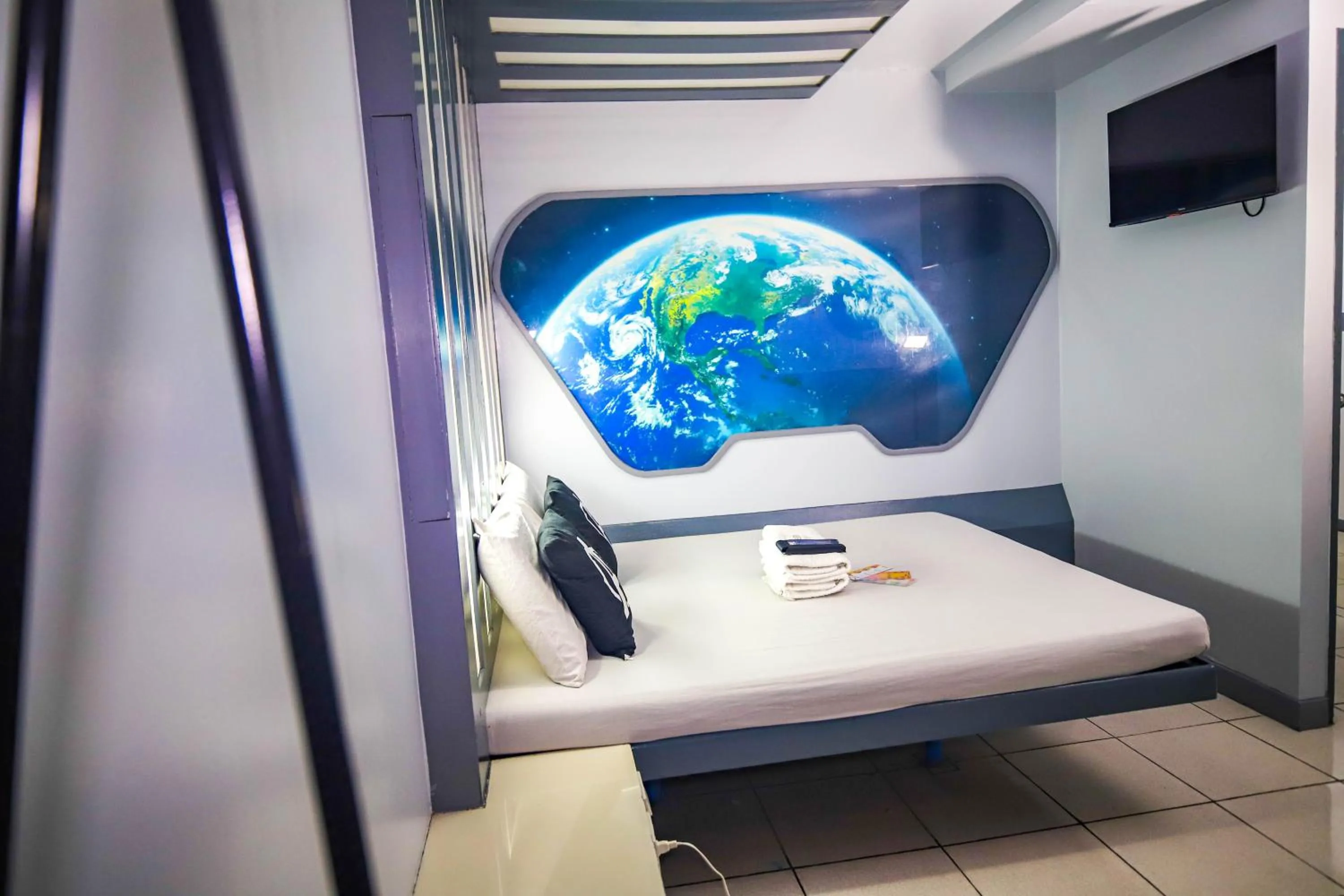 Bed in Astrotel Monumento