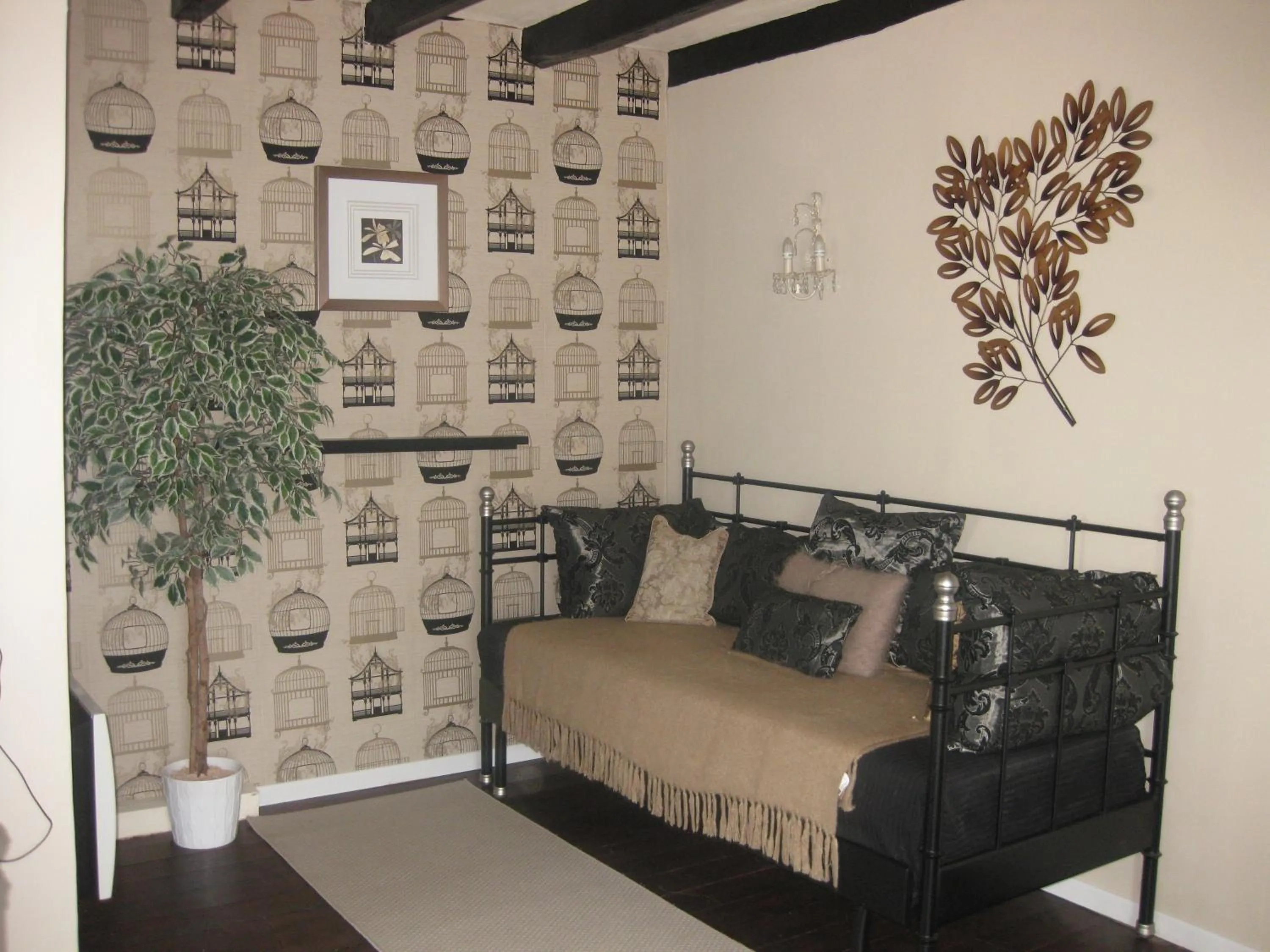 Bed in Le Petit Cochon chambre d` hotes