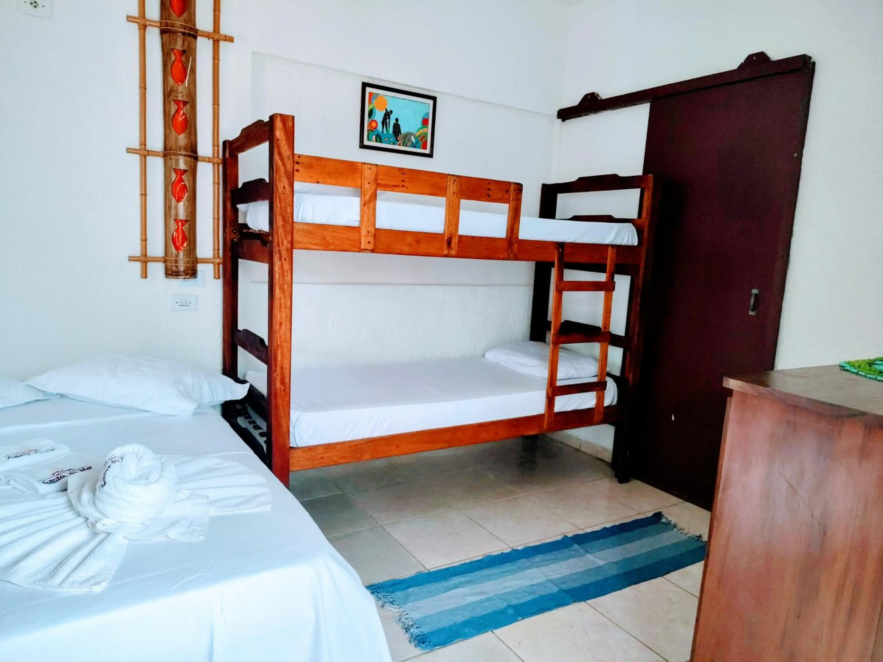 Bed in Pousada Aconchego Recanto Do Mar