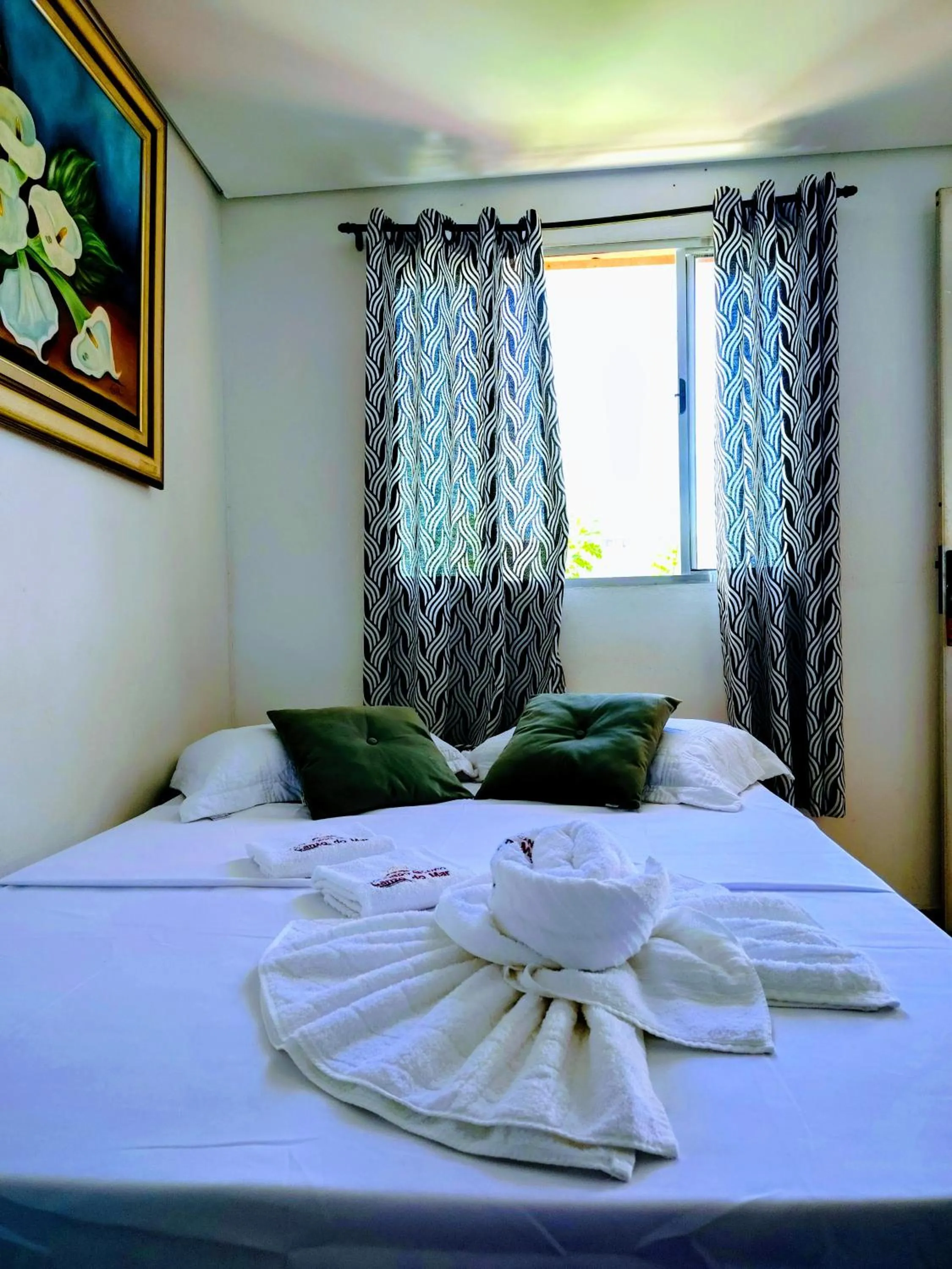 Bed in Pousada Aconchego Recanto Do Mar