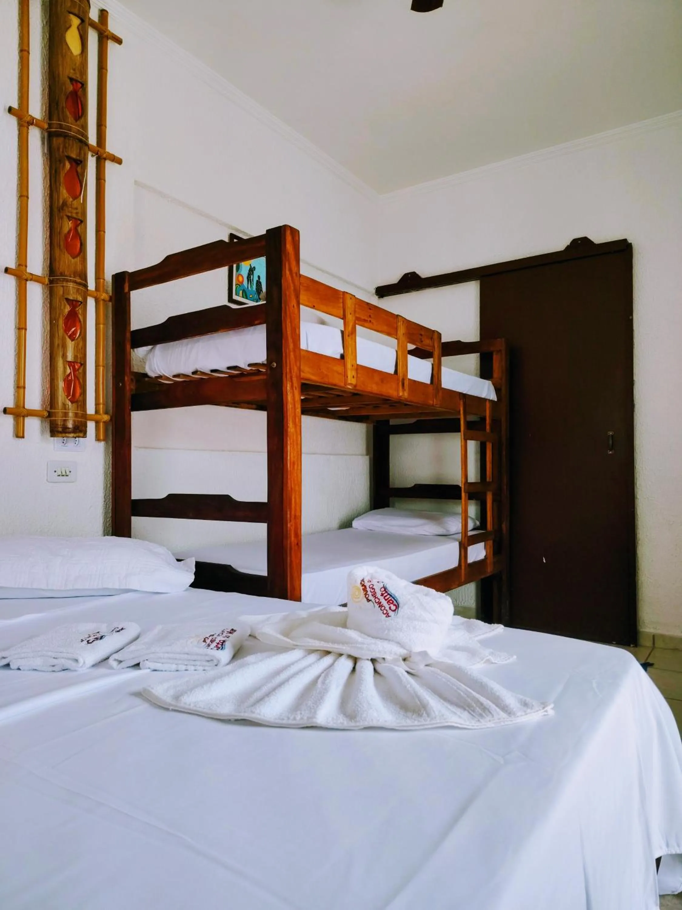 Bed in Pousada Aconchego Recanto Do Mar