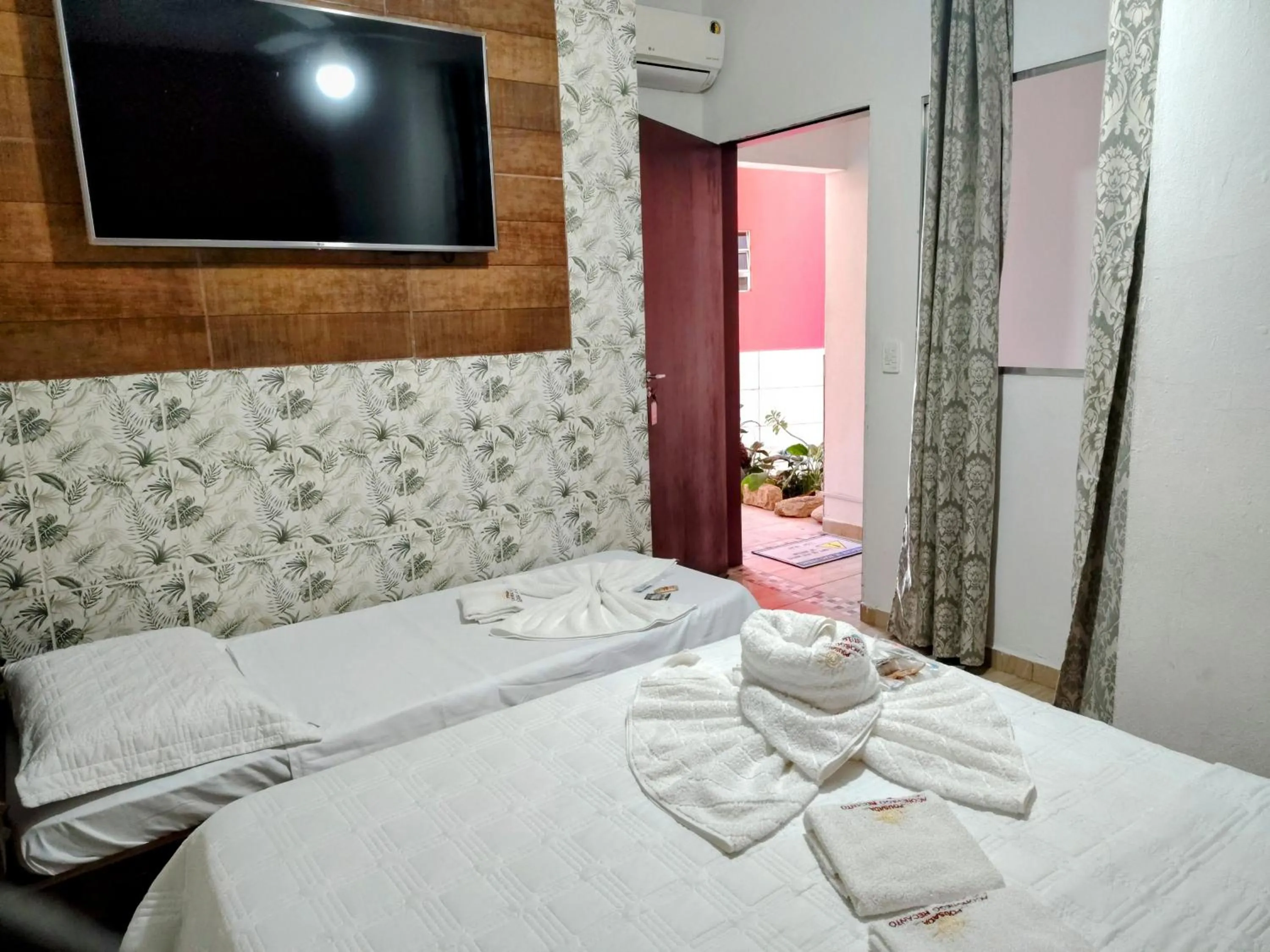 Bed in Pousada Aconchego Recanto Do Mar