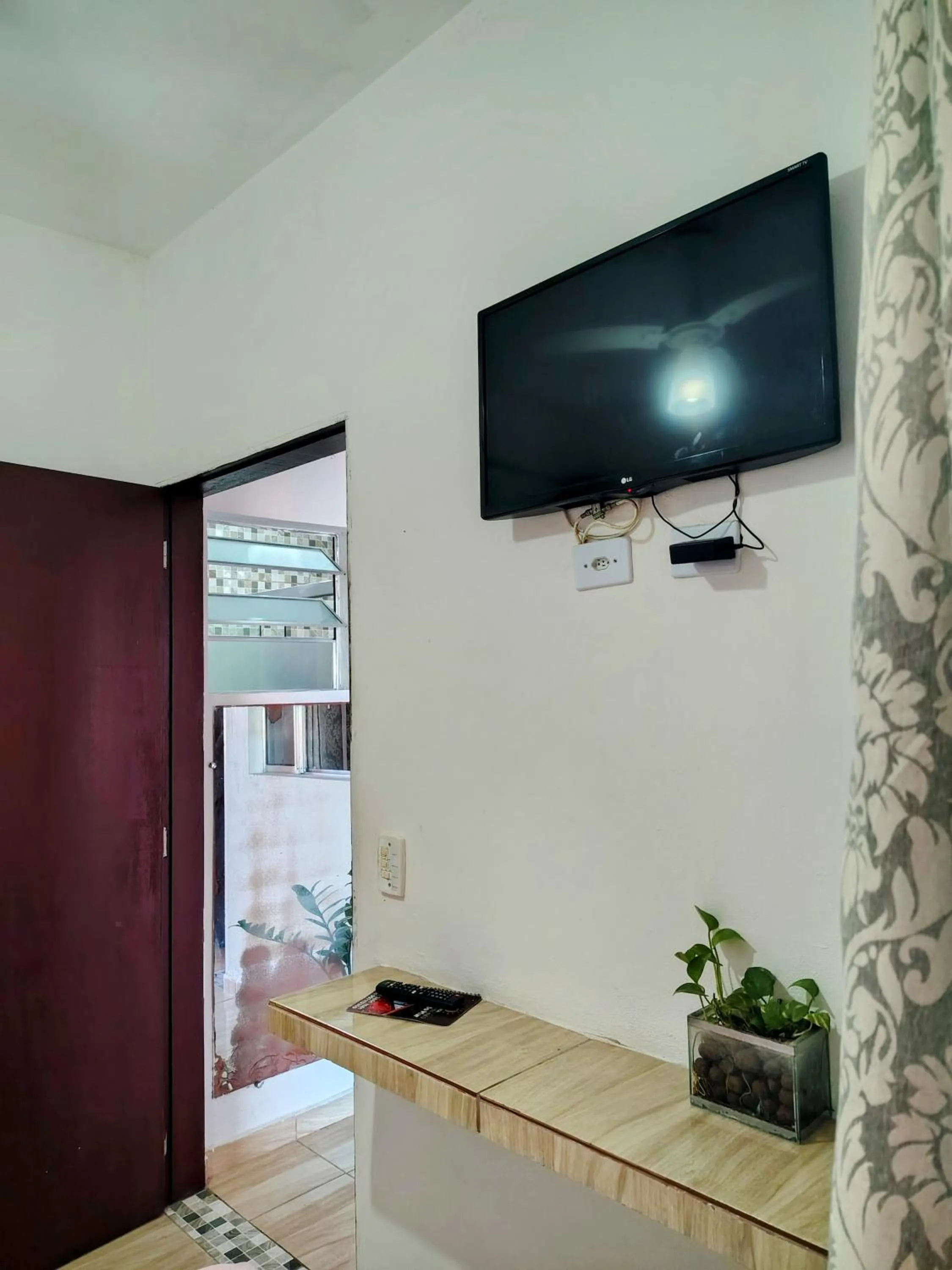 TV and multimedia in Pousada Aconchego Recanto Do Mar