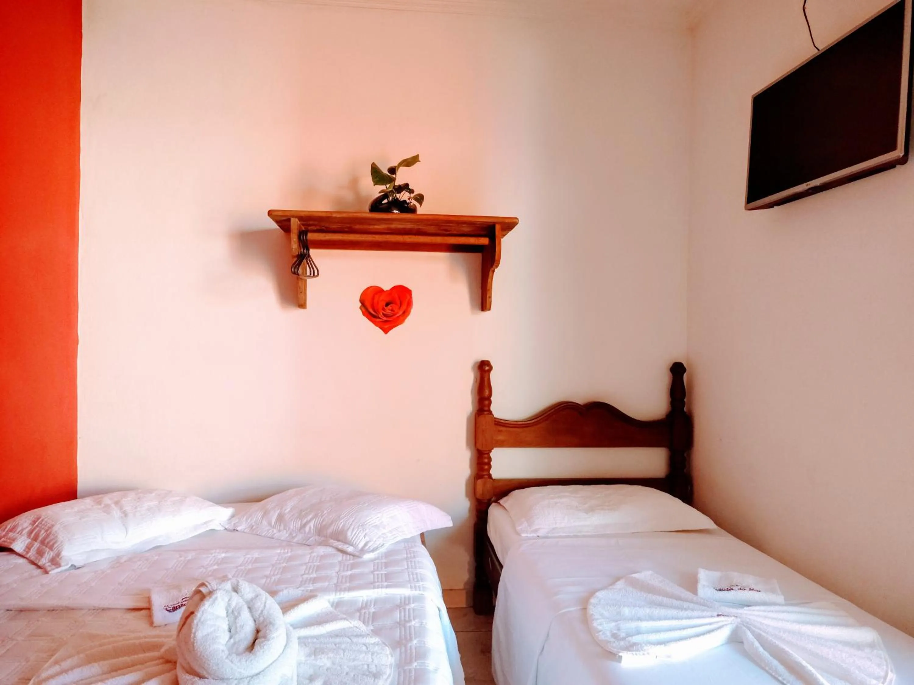 Bed in Pousada Aconchego Recanto Do Mar