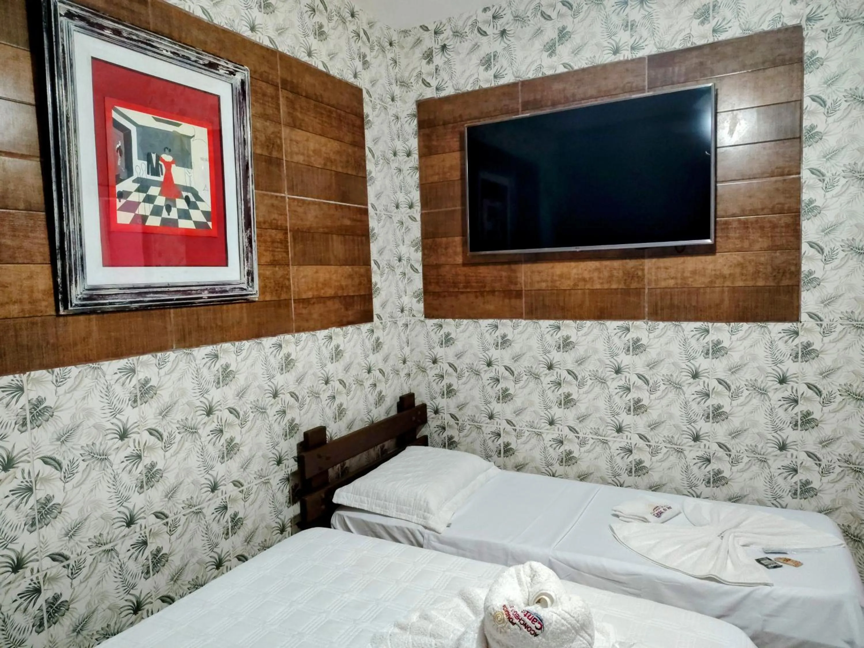 Bed in Pousada Aconchego Recanto Do Mar