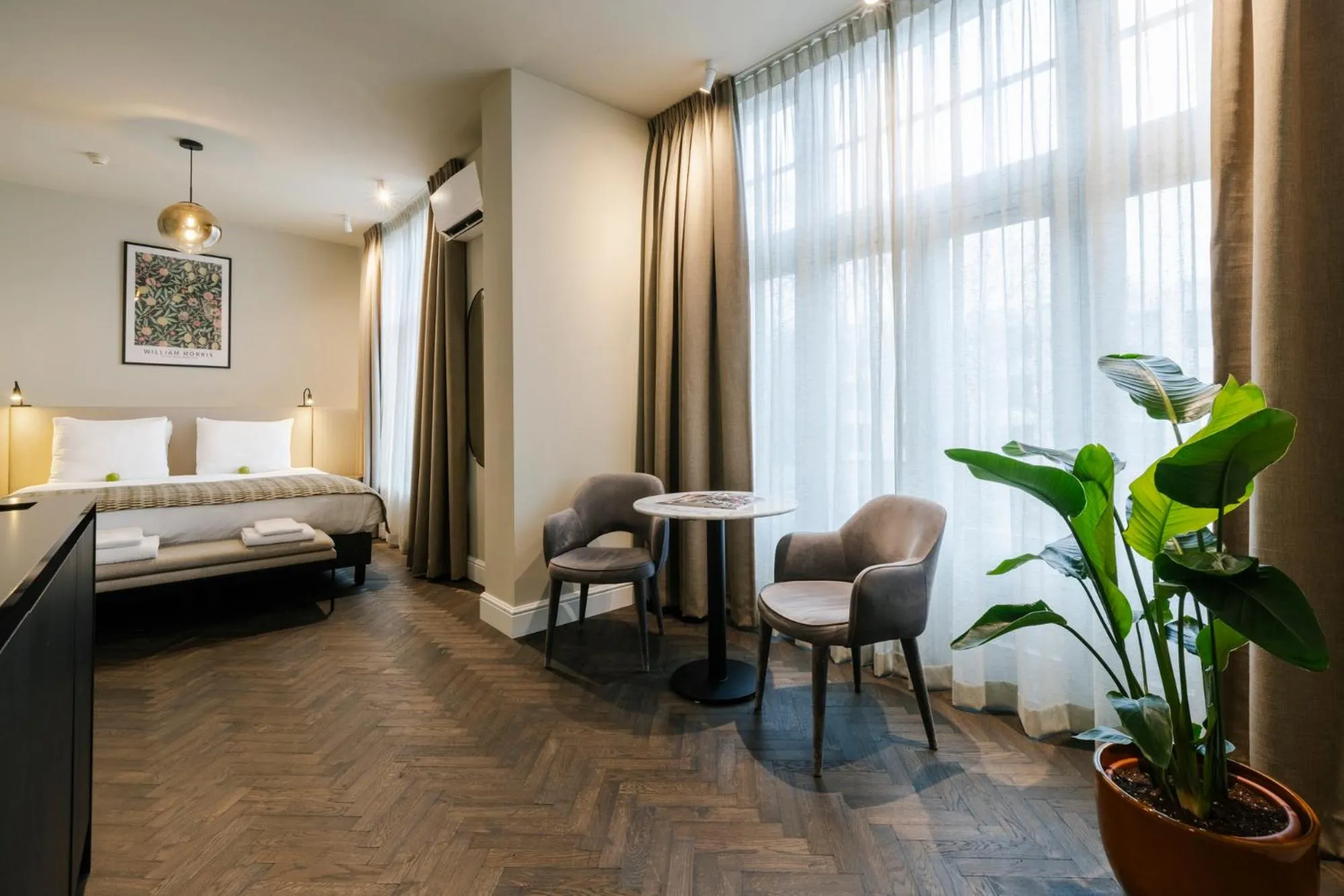 Seating area, Bed in Hotel Bloemendaal by BHC