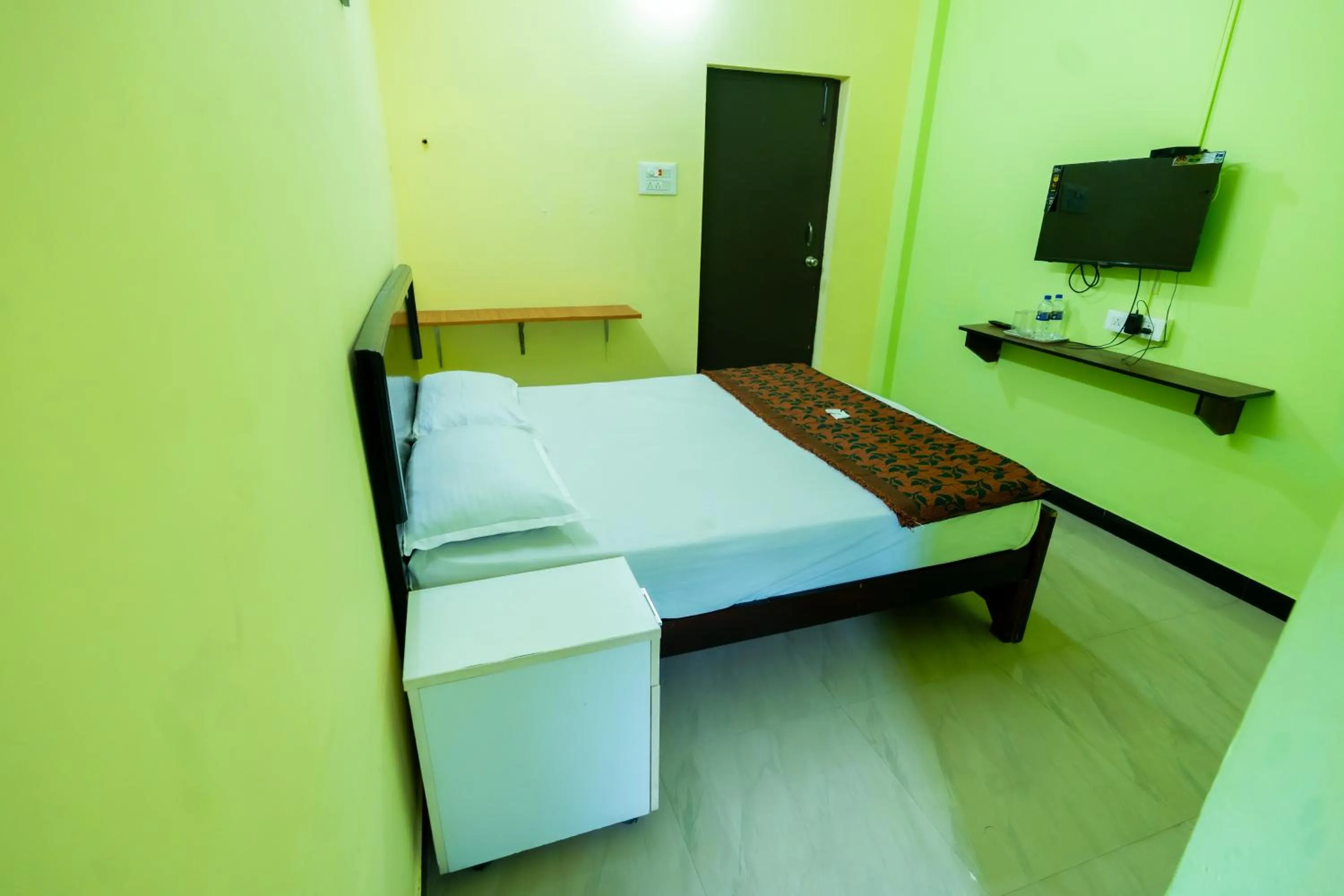 Photo of the whole room, Bed in Aryas Residency- Near Isha Foundation Coimbatore & Karunya University
