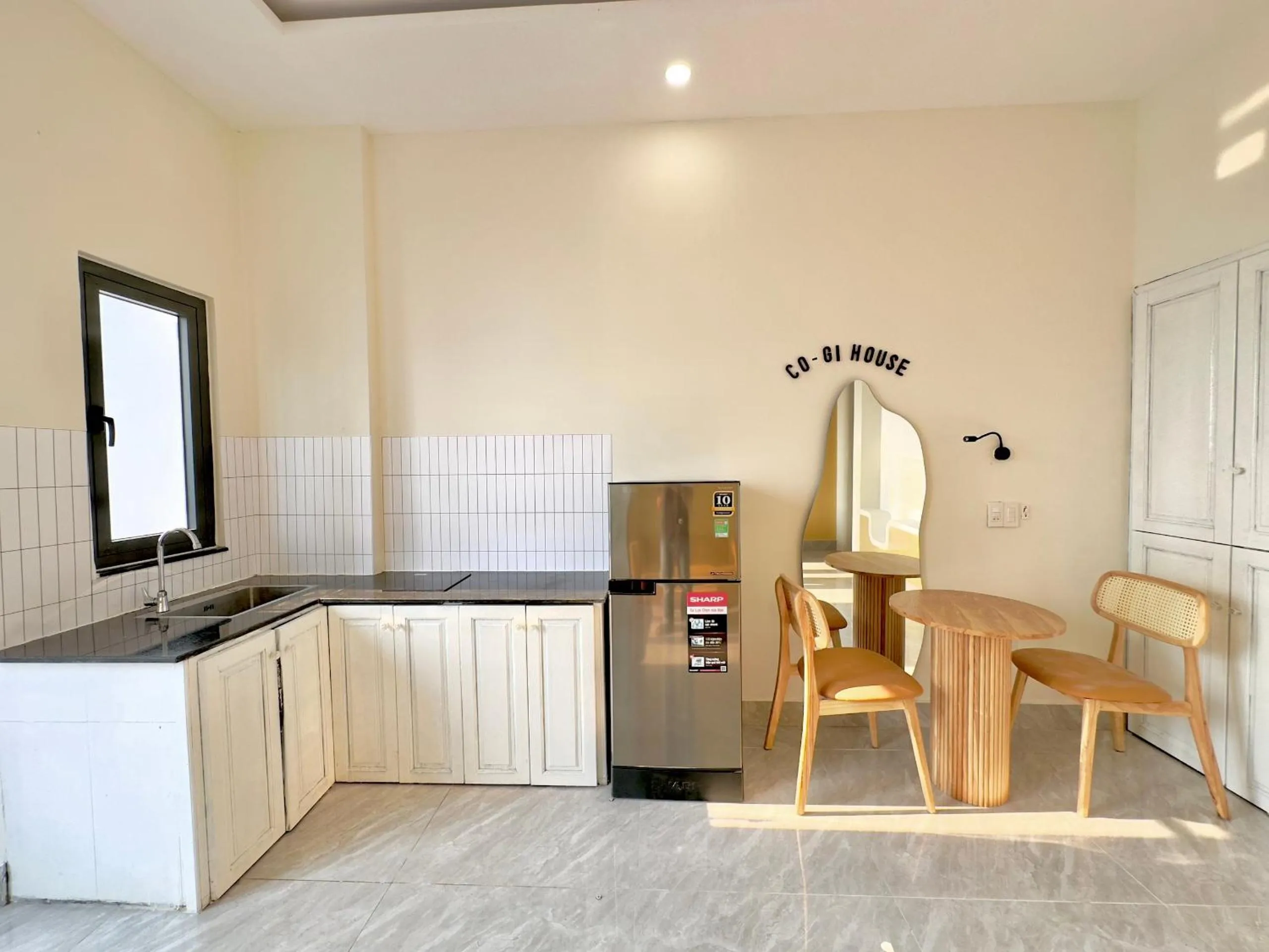 Kitchen or kitchenette in Corgi House Danang