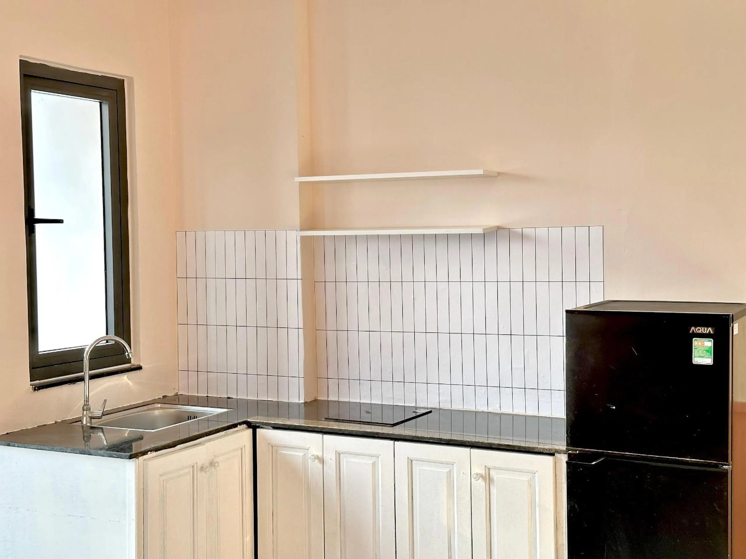 Kitchen or kitchenette in Corgi House Danang