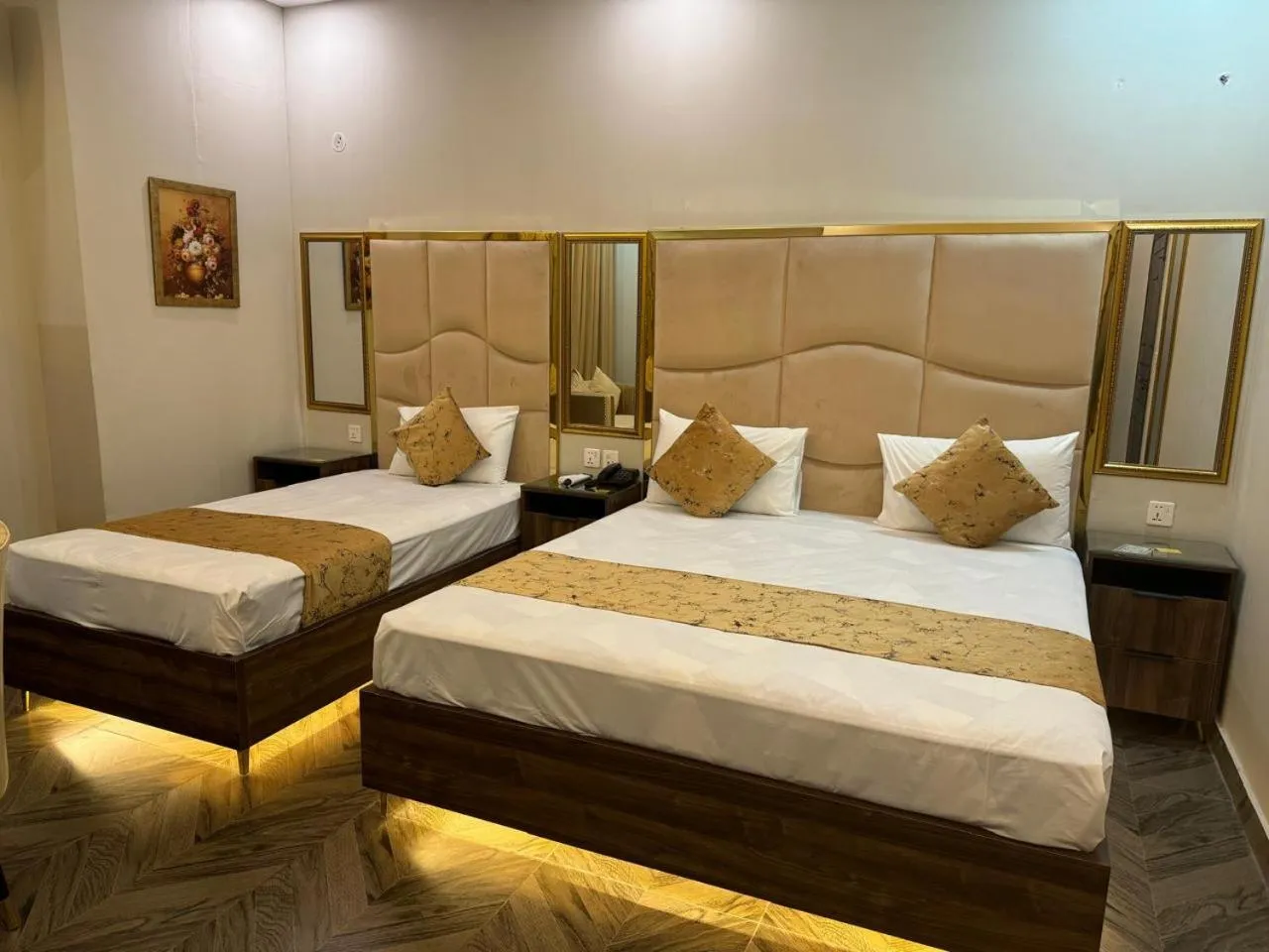 Bed in Gold Pine Hotel Lahore