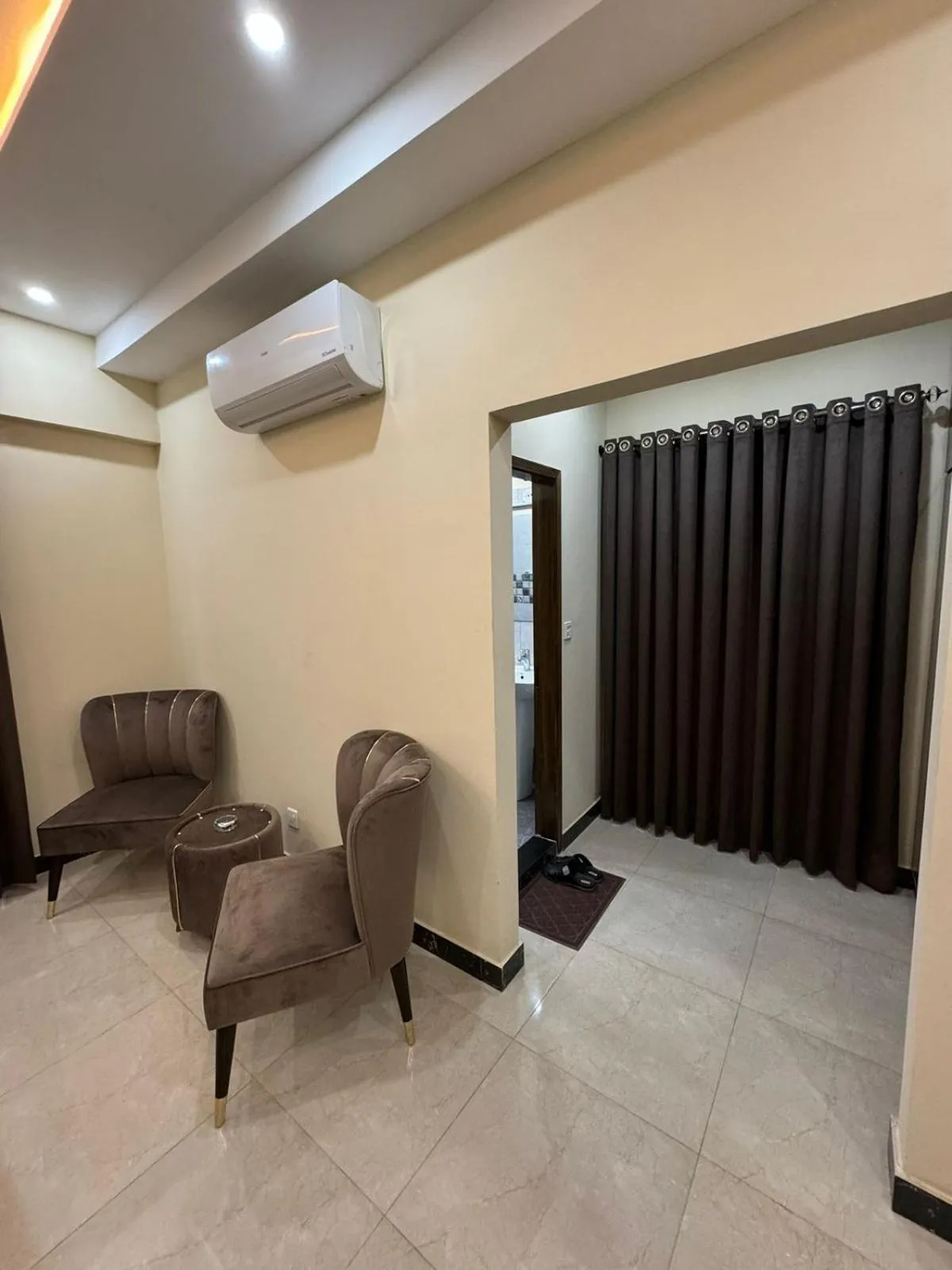 Seating area in Gold Pine Hotel Lahore