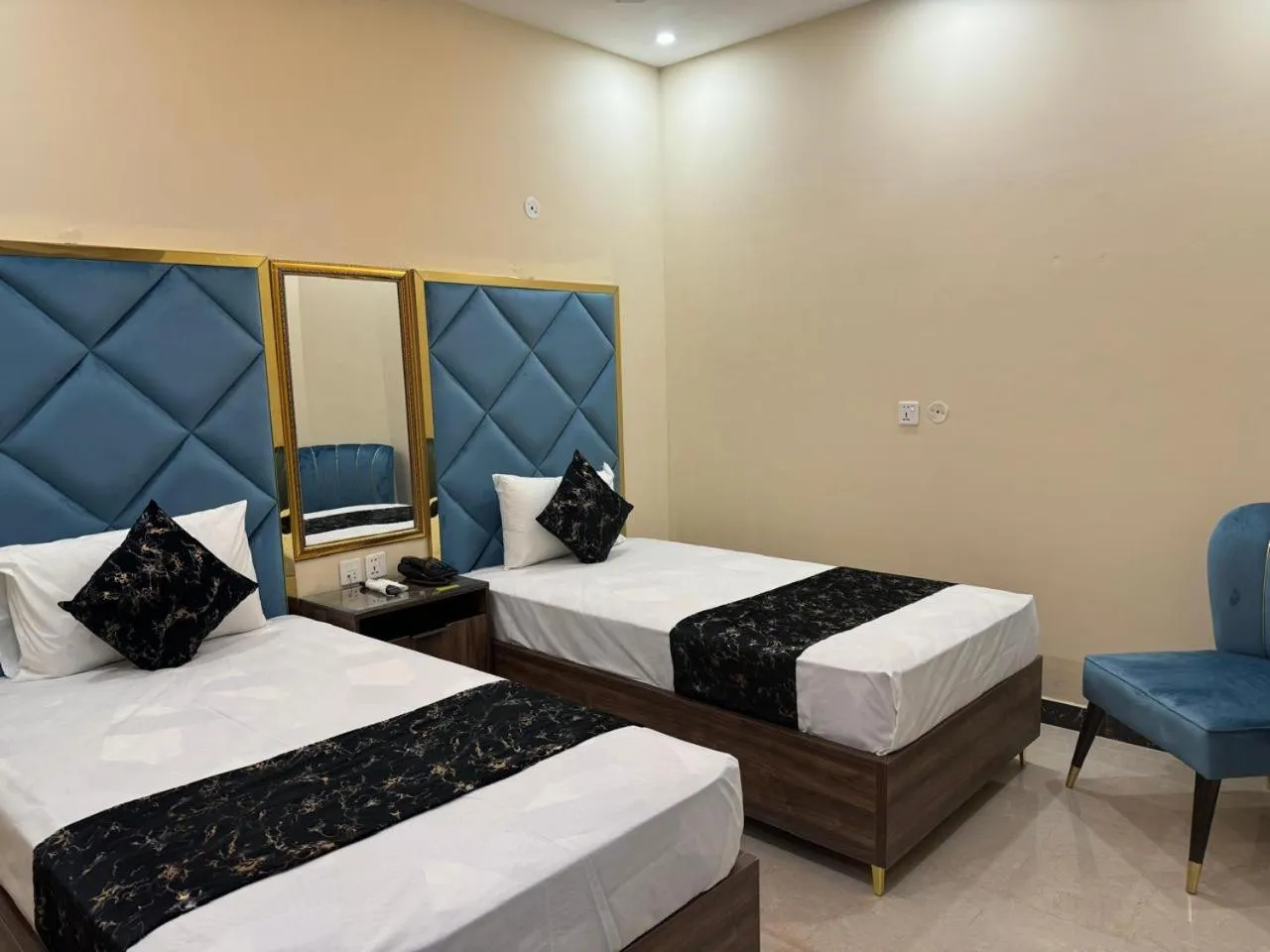 Photo of the whole room, Bed in Gold Pine Hotel Lahore