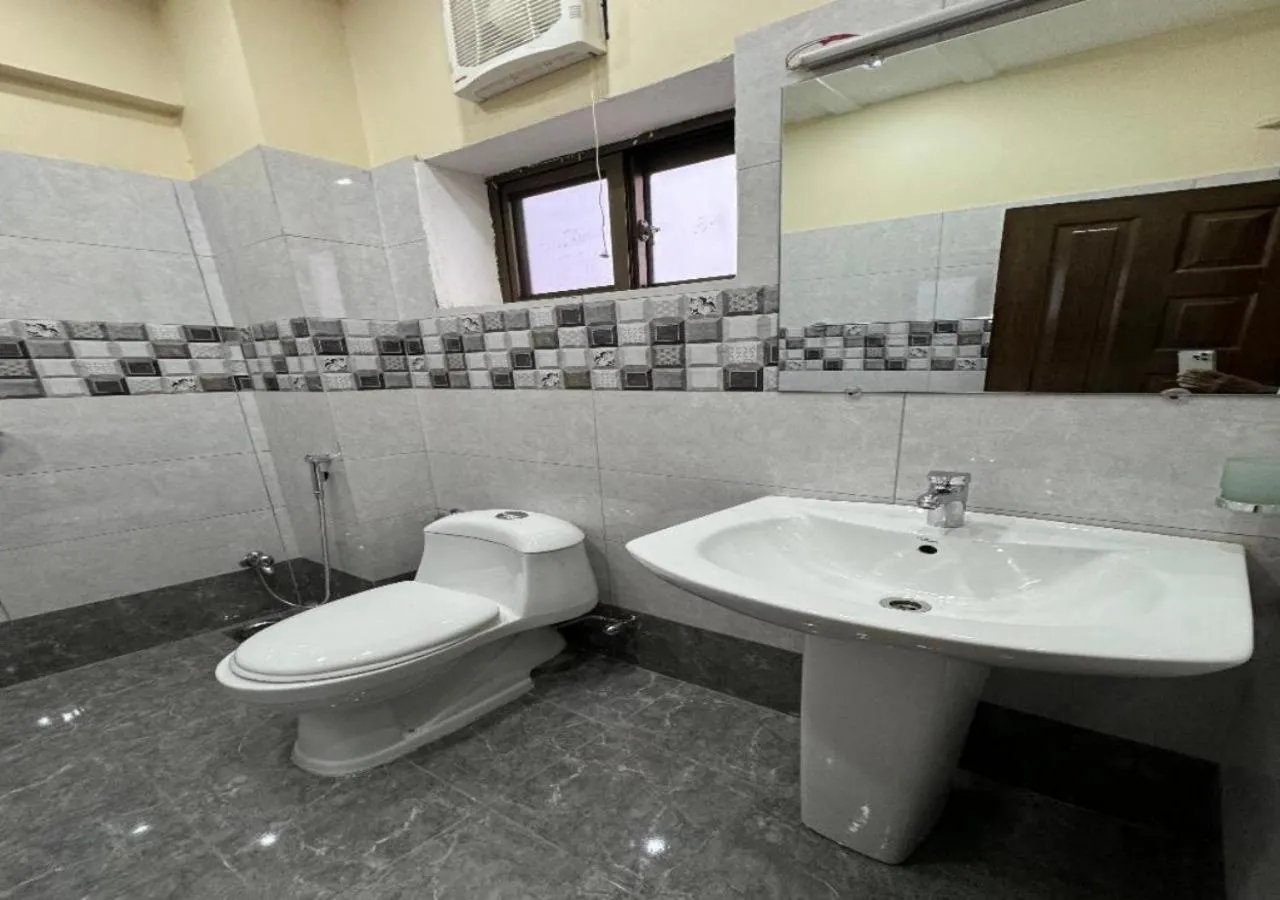 Bathroom in Gold Pine Hotel Lahore