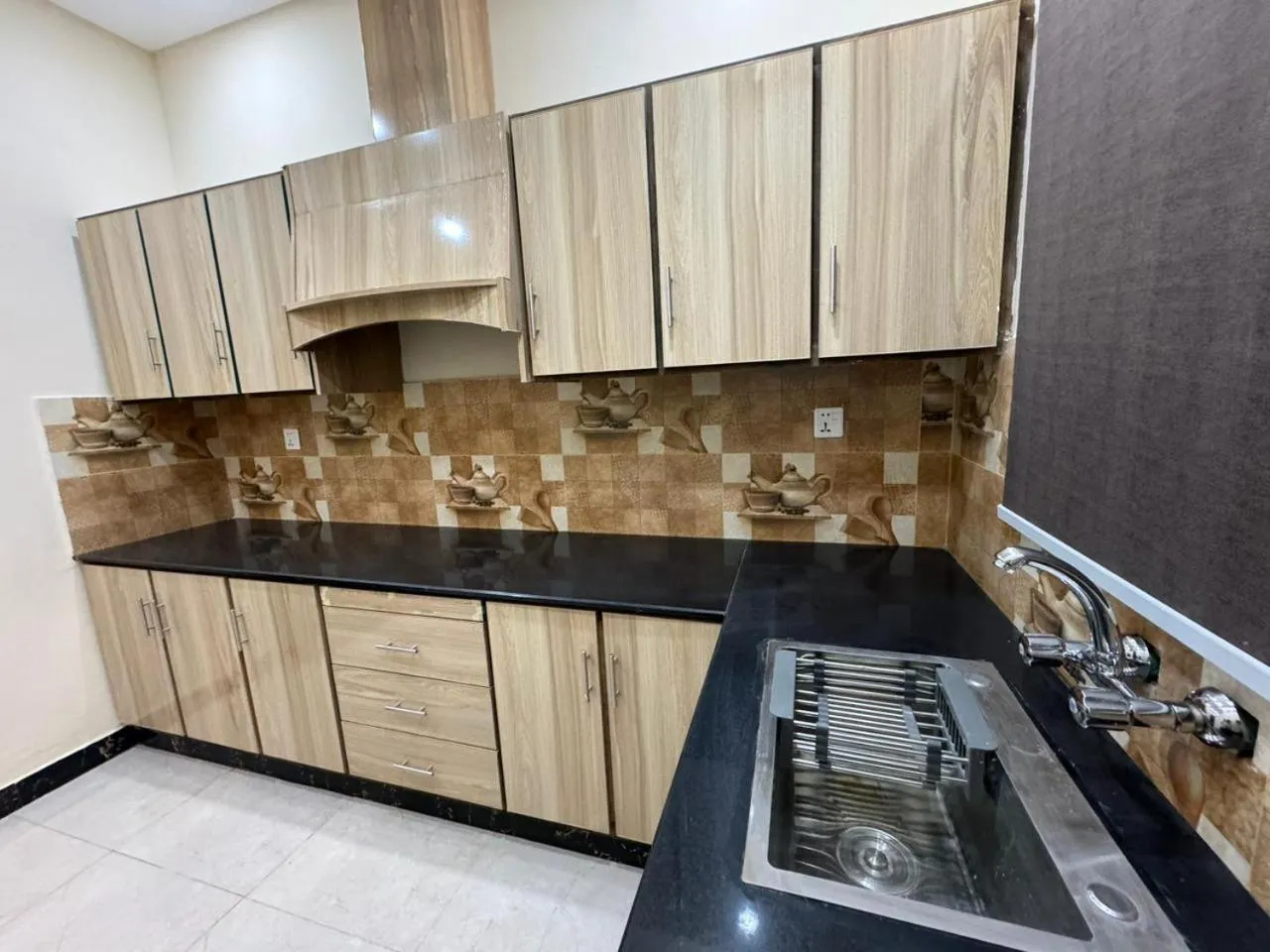 Kitchen or kitchenette in Gold Pine Hotel Lahore