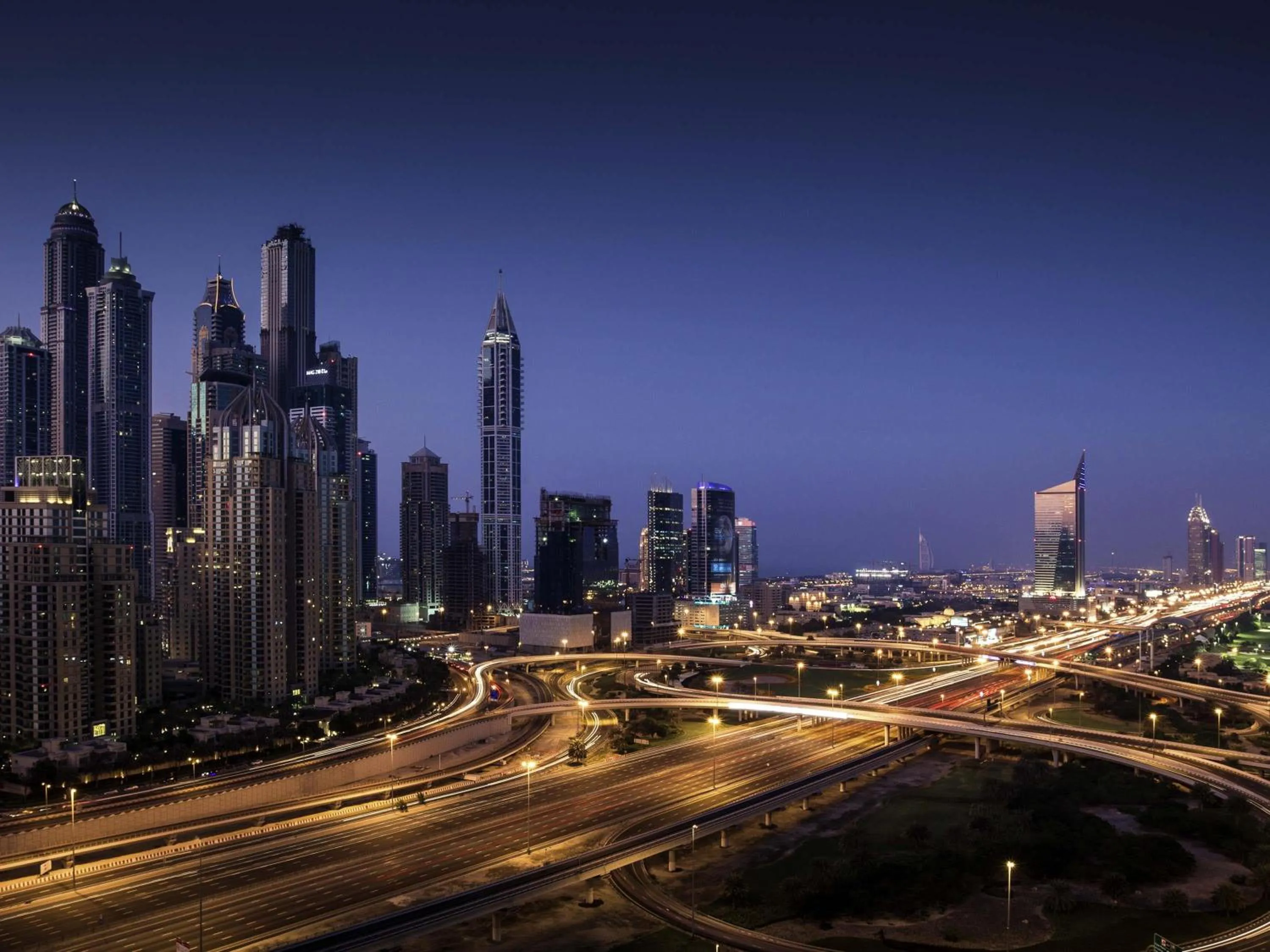 Bedroom in Pullman Dubai Jumeirah Lakes Towers